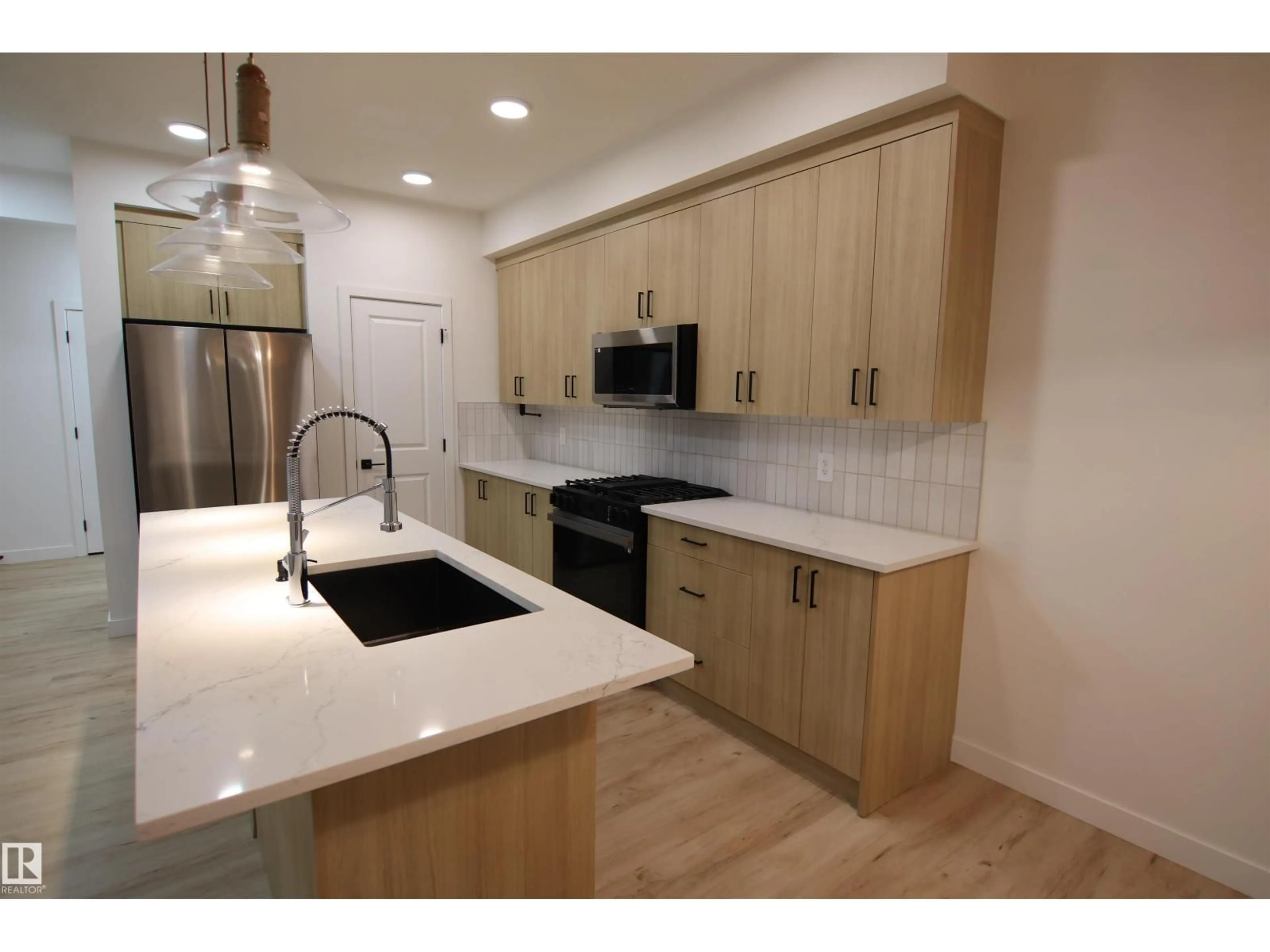 Open concept kitchen, unknown for SW - 3332 168 ST, Edmonton Alberta T6W5M2