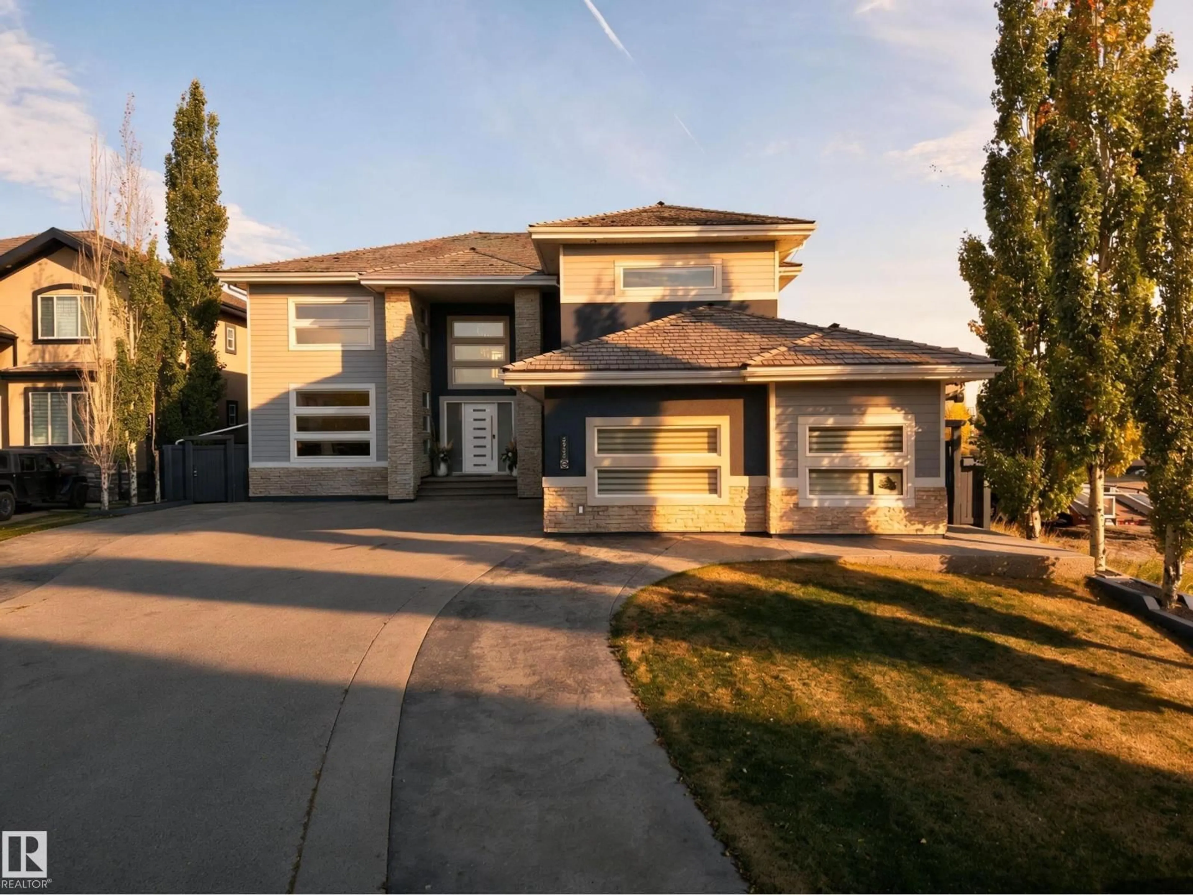 Home with vinyl exterior material, street for 5935 30 ST, Rural Leduc County Alberta T4X0X4