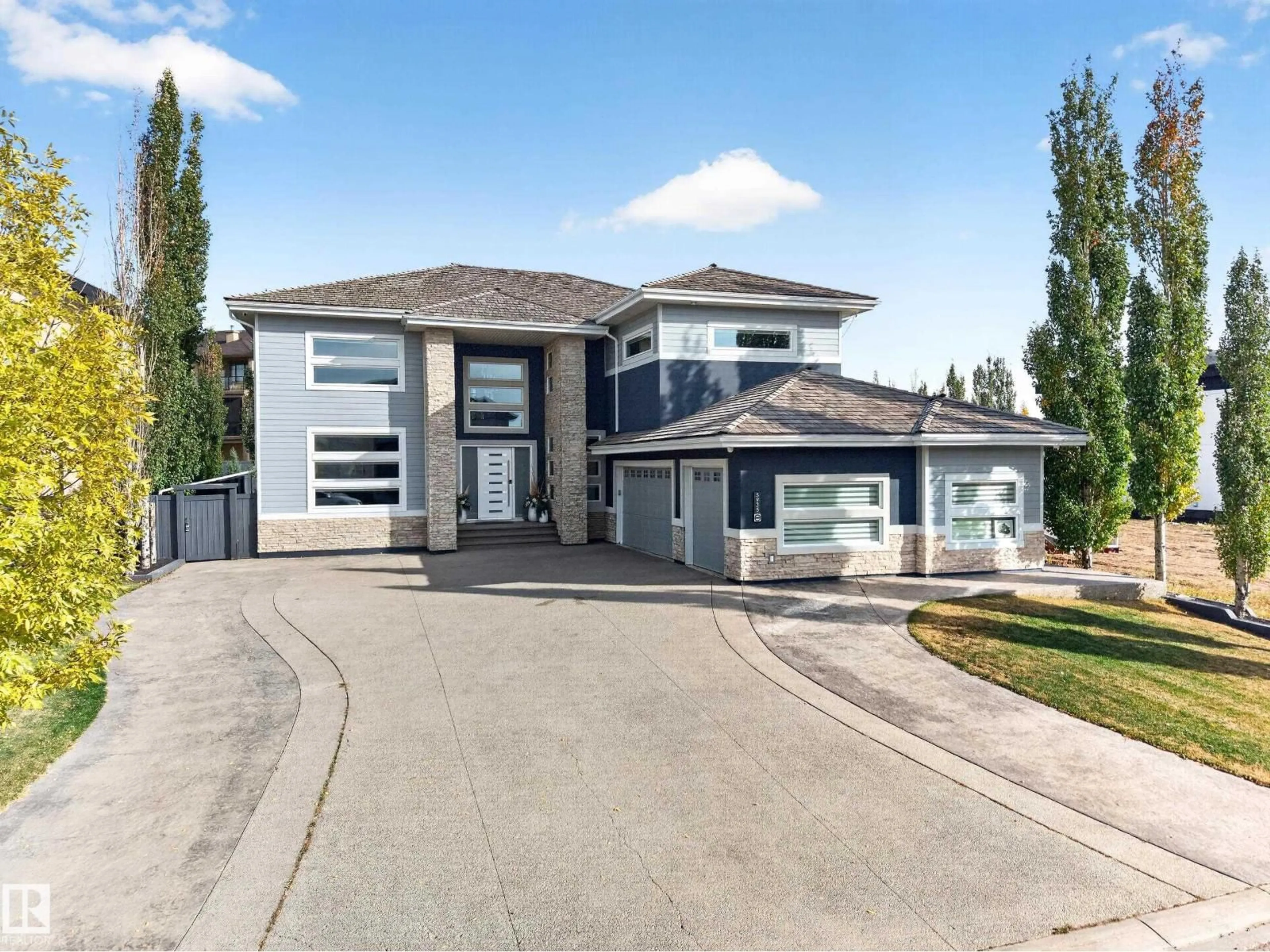 Home with vinyl exterior material, street for 5935 30 ST, Rural Leduc County Alberta T4X0X4