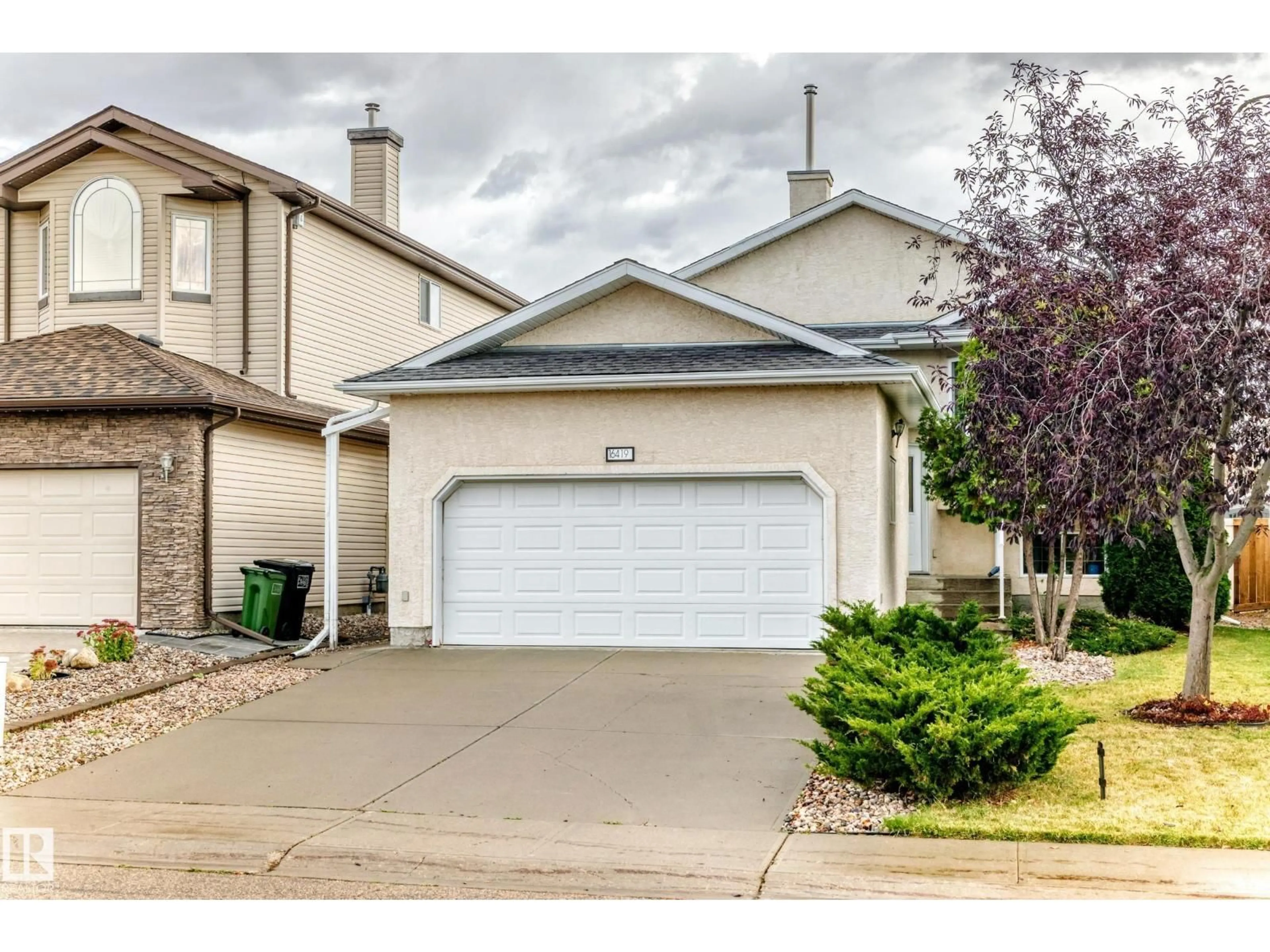 Home with vinyl exterior material, street for NW - 16419 89 ST, Edmonton Alberta T5Z3S1