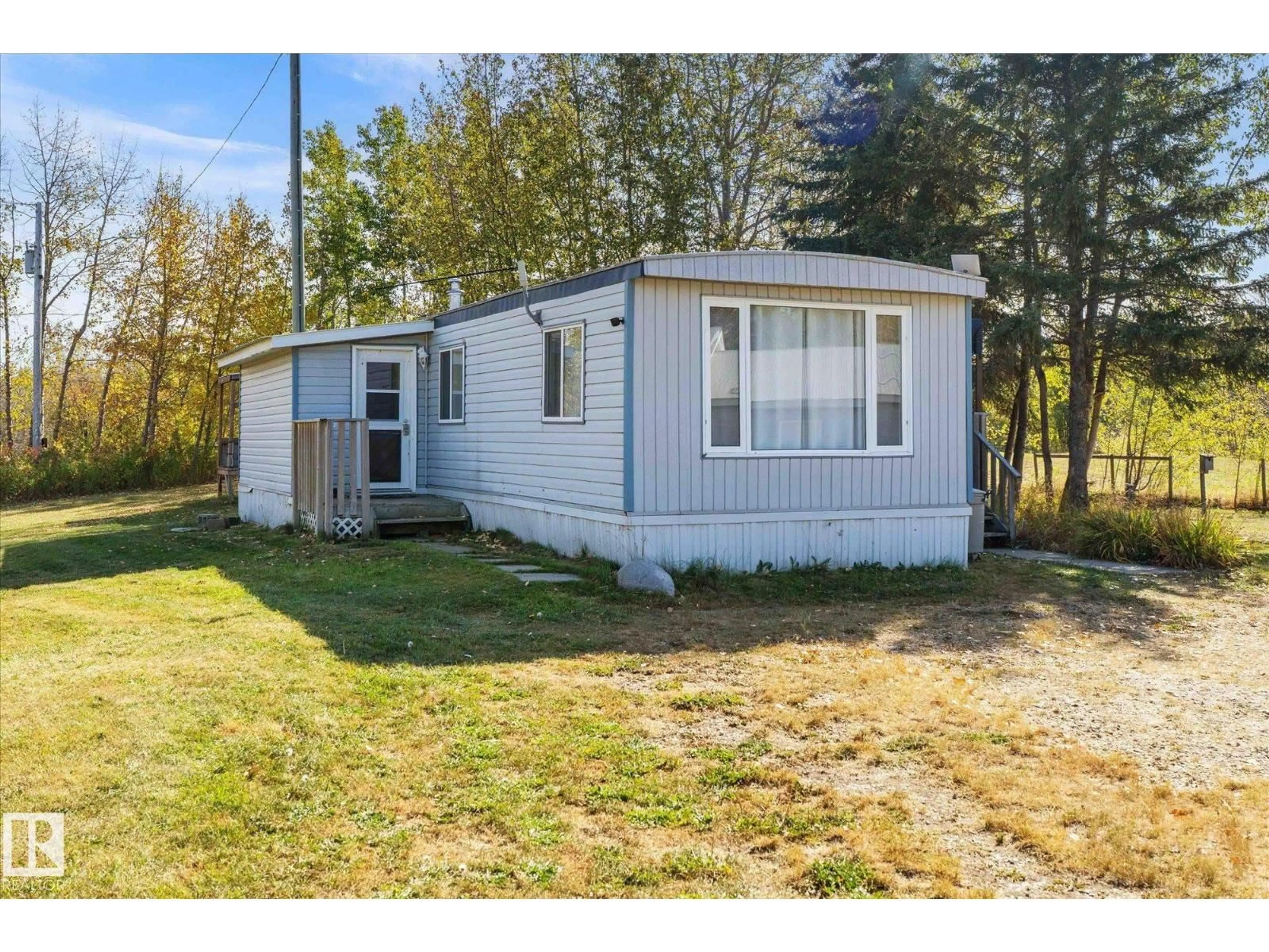 Home with vinyl exterior material, street for 53319 - 301 RGE ROAD 31, Rural Parkland County Alberta T7Y0E3