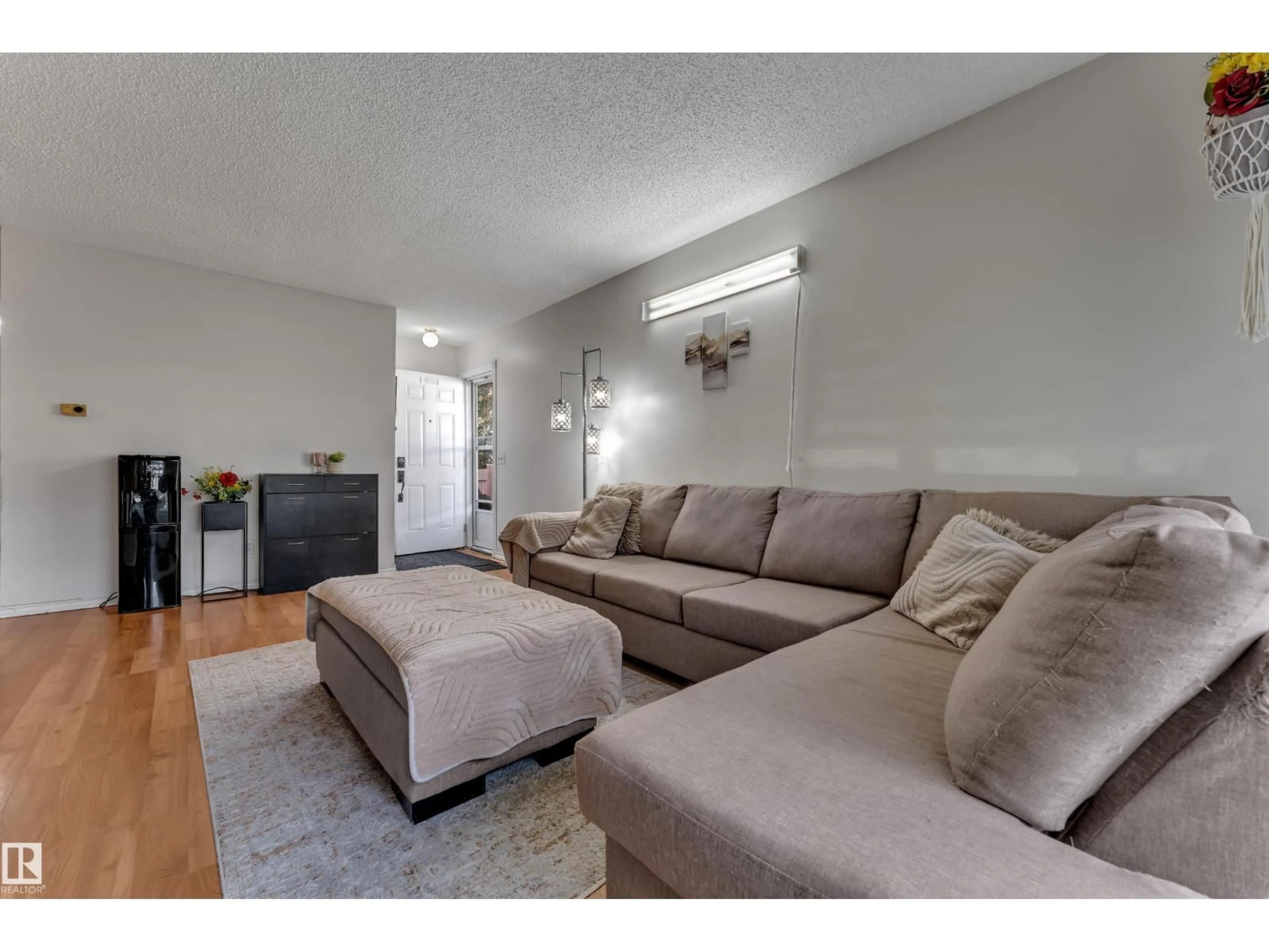 Living room with furniture, unknown for 2114 38 ST, Edmonton Alberta T6L4C3