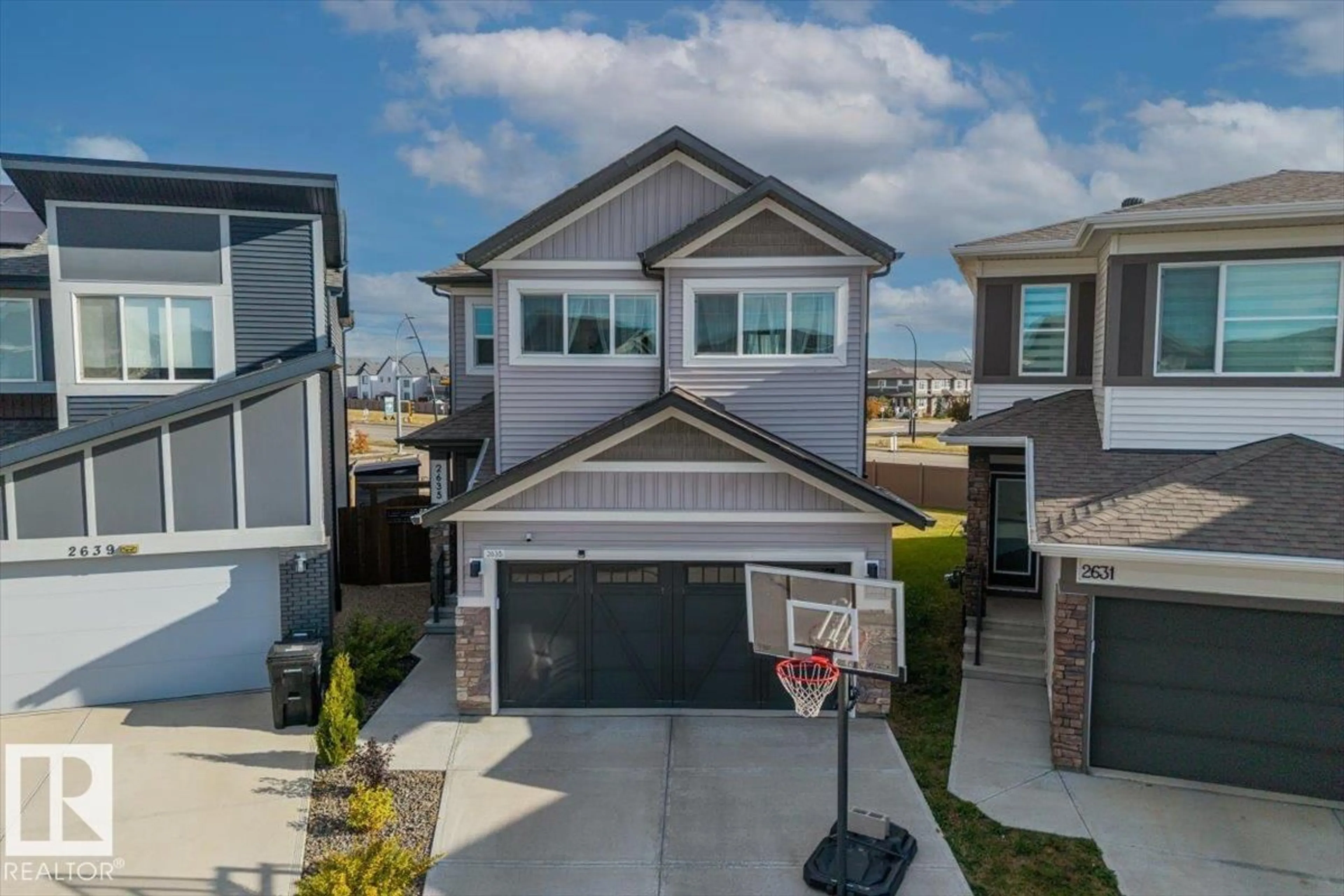 A pic from outside/outdoor area/front of a property/back of a property/a pic from drone, street for NW - 2635 200 ST, Edmonton Alberta T6M1K3