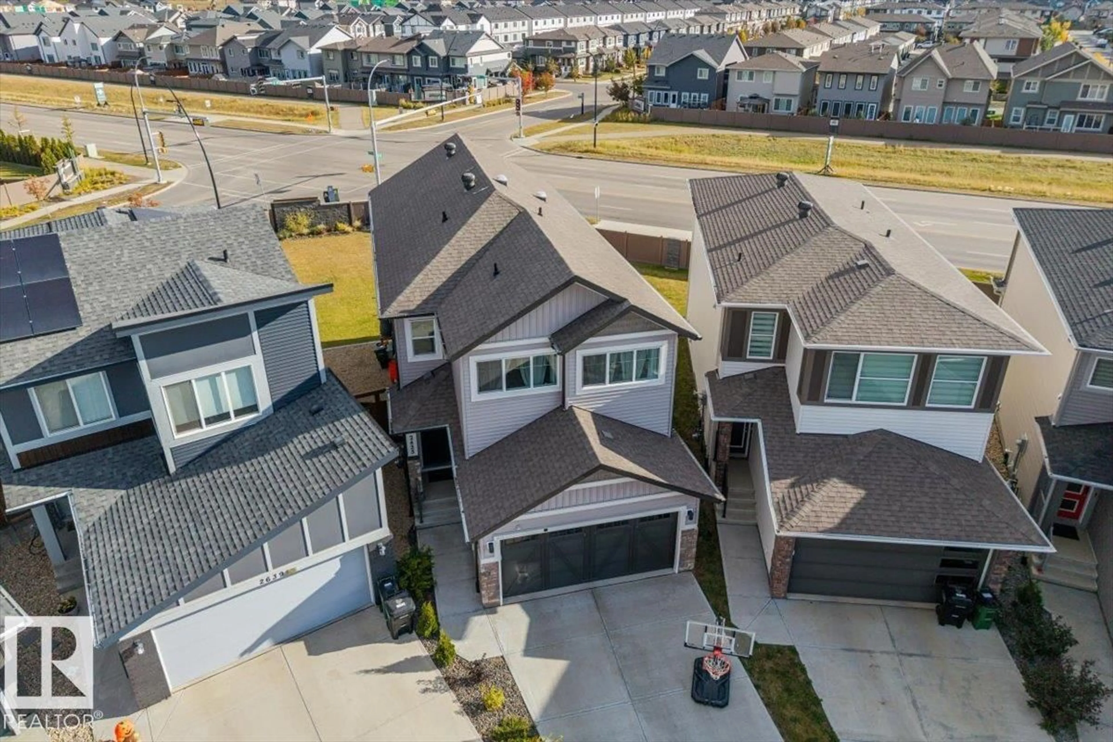 A pic from outside/outdoor area/front of a property/back of a property/a pic from drone, street for NW - 2635 200 ST, Edmonton Alberta T6M1K3
