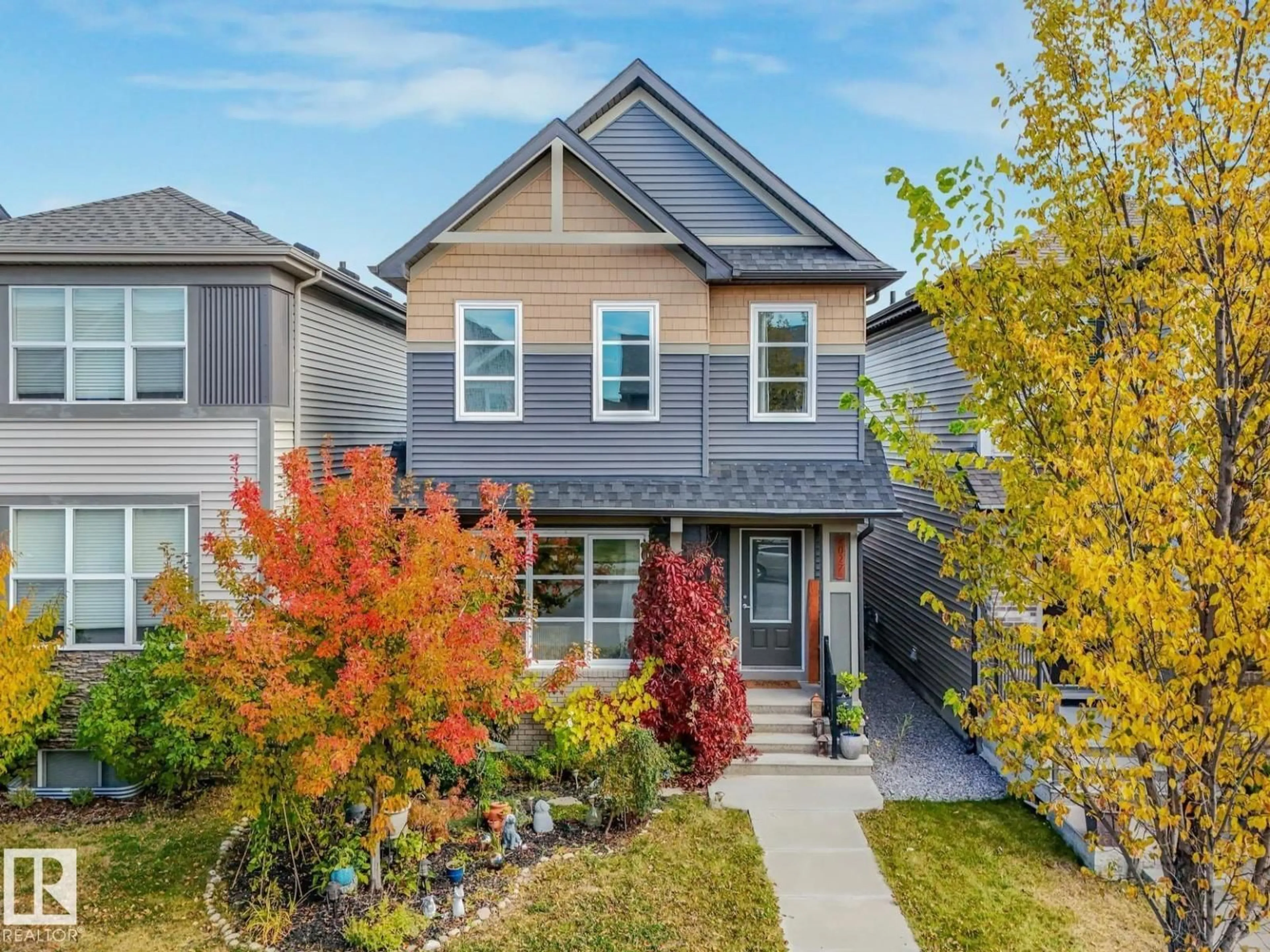 Home with vinyl exterior material, street for 2027 CAVANAGH DR, Edmonton Alberta T6W3M7