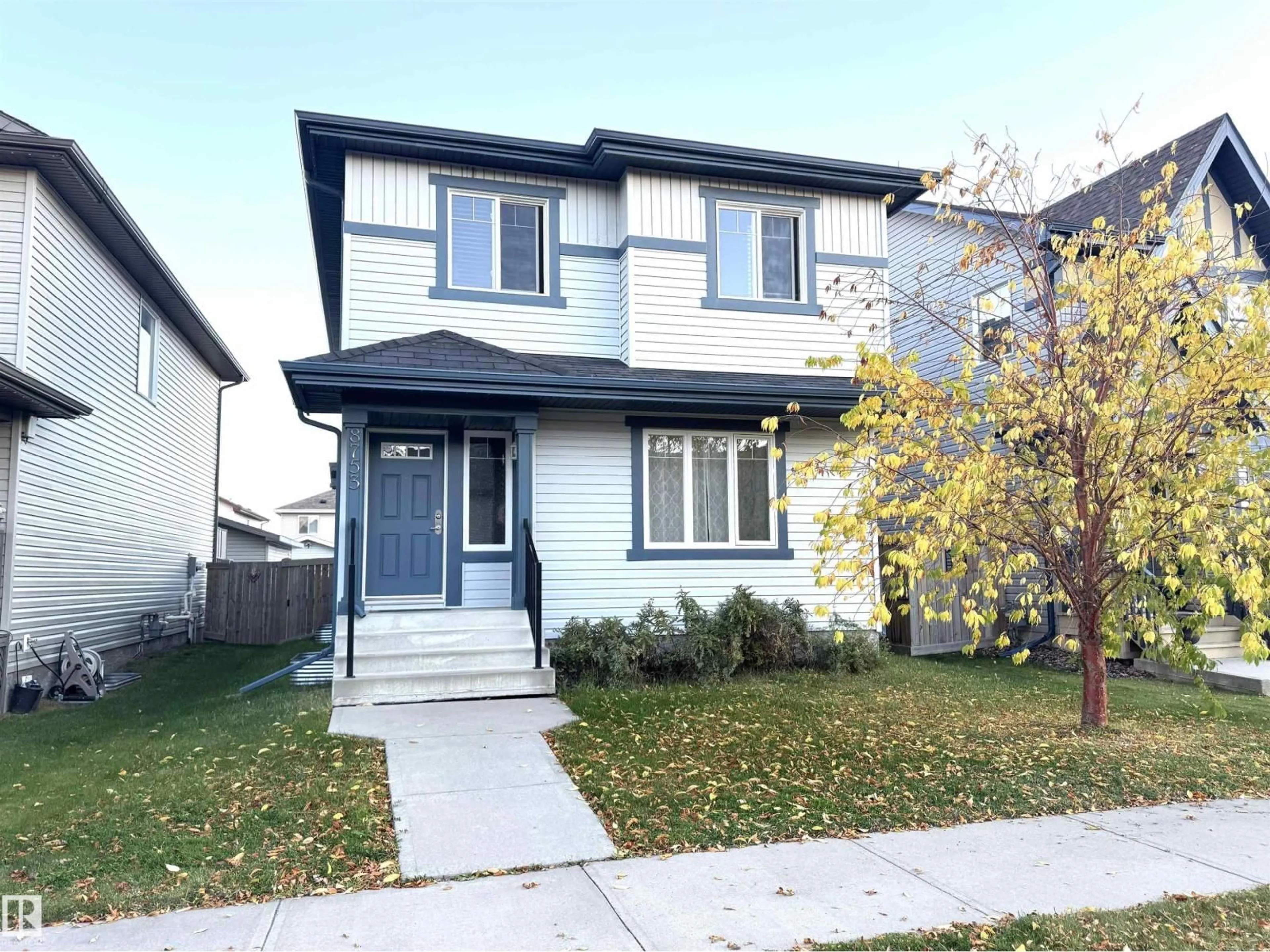 Home with vinyl exterior material, street for NW - 8753 180A AV, Edmonton Alberta T5Z0G6