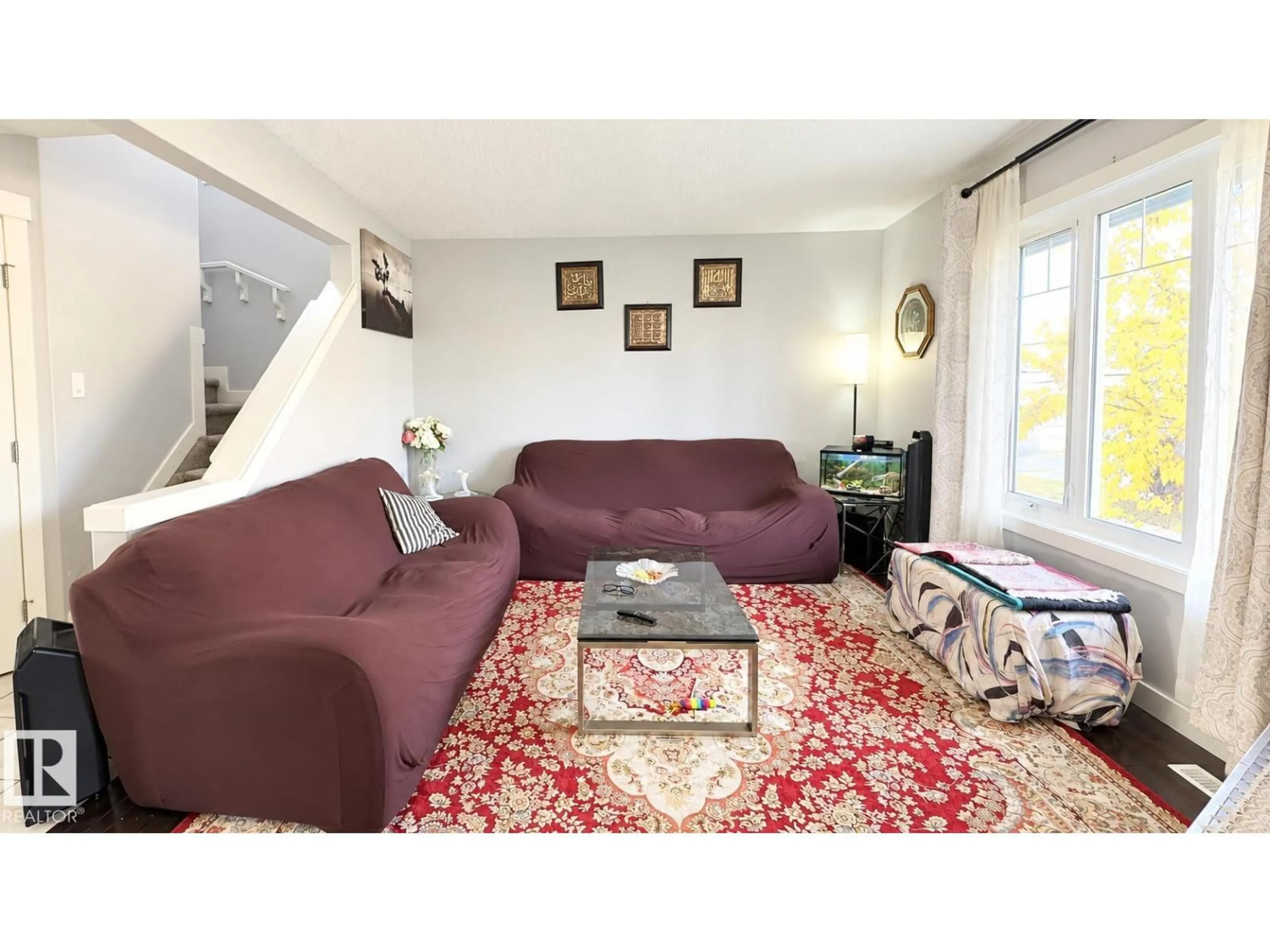 Living room with furniture, unknown for NW - 8753 180A AV, Edmonton Alberta T5Z0G6