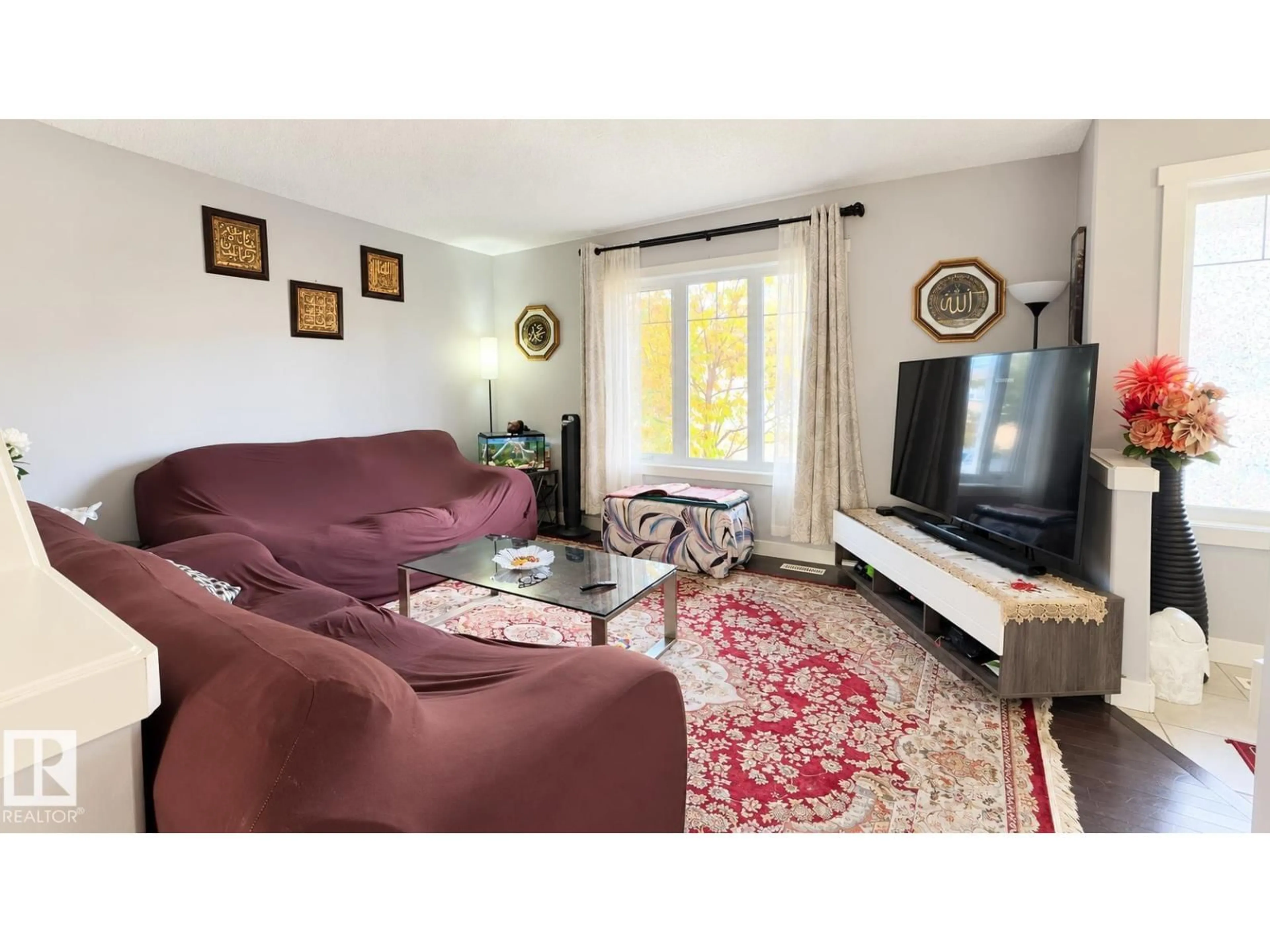 Living room with furniture, unknown for NW - 8753 180A AV, Edmonton Alberta T5Z0G6