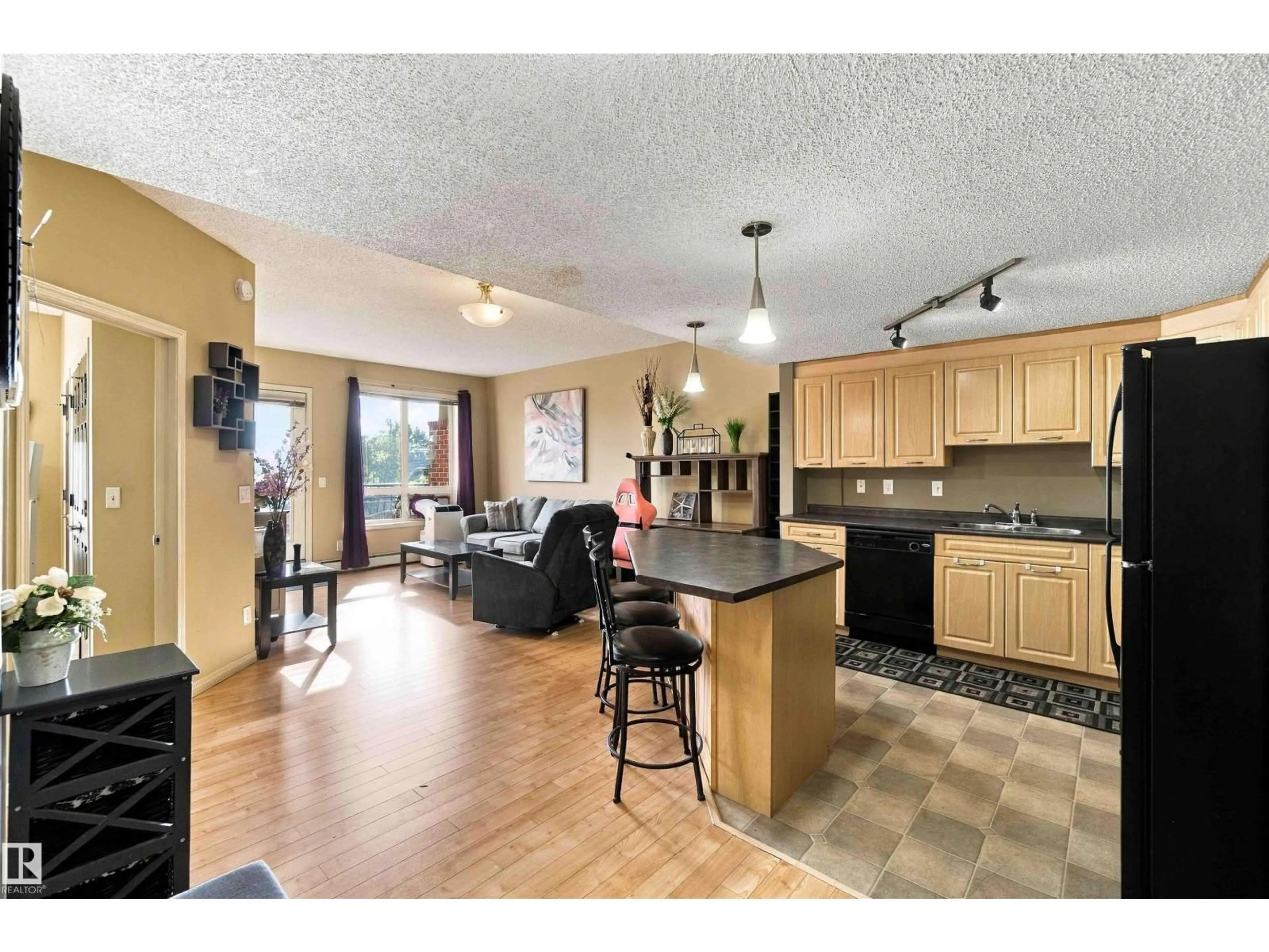 Open concept kitchen, unknown for #202 - 6220 134 AV, Edmonton Alberta T5A0A8