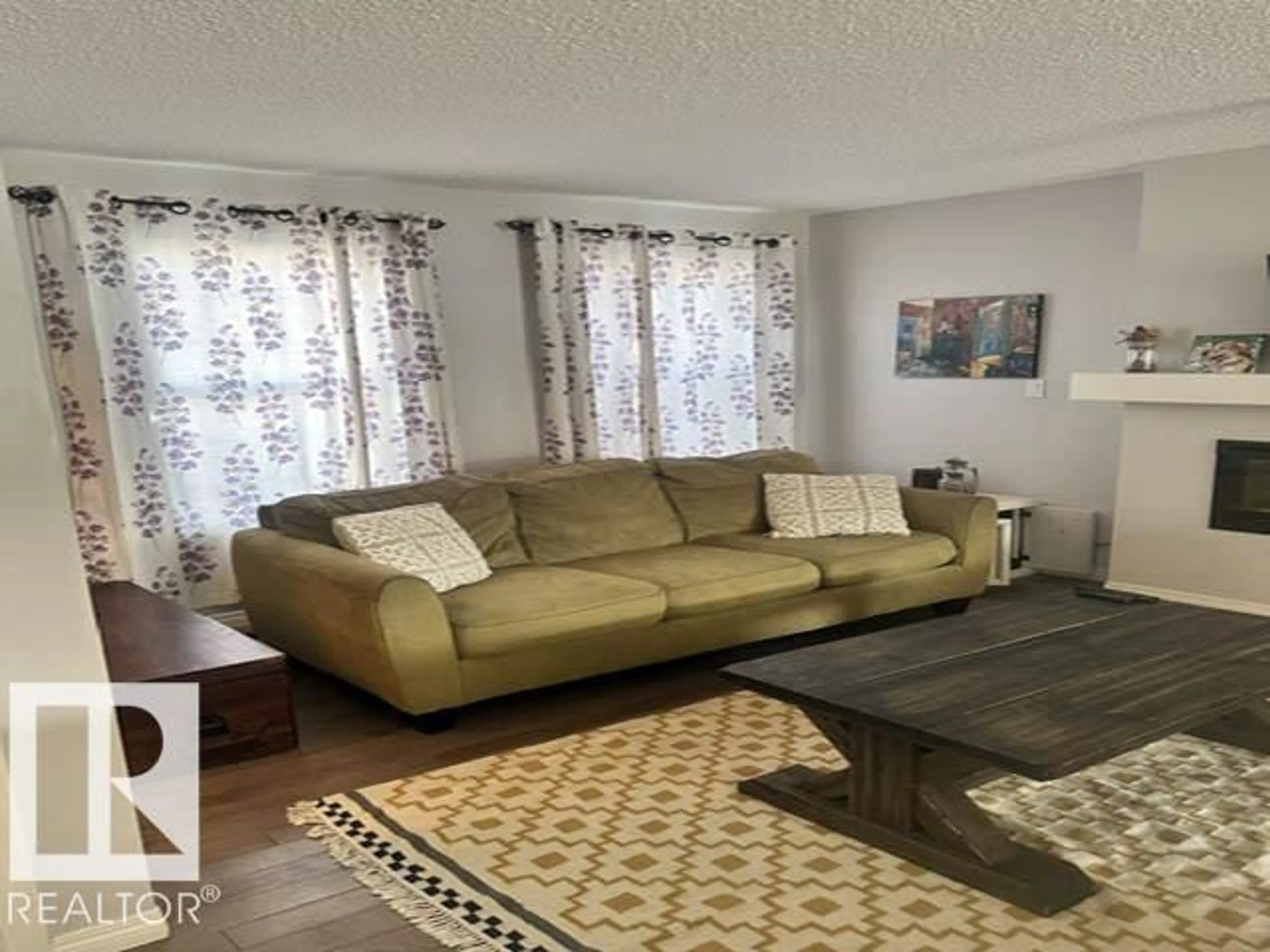Living room with furniture, unknown for 8323 ELISS CRESCENT, Edmonton Alberta T6M0P8