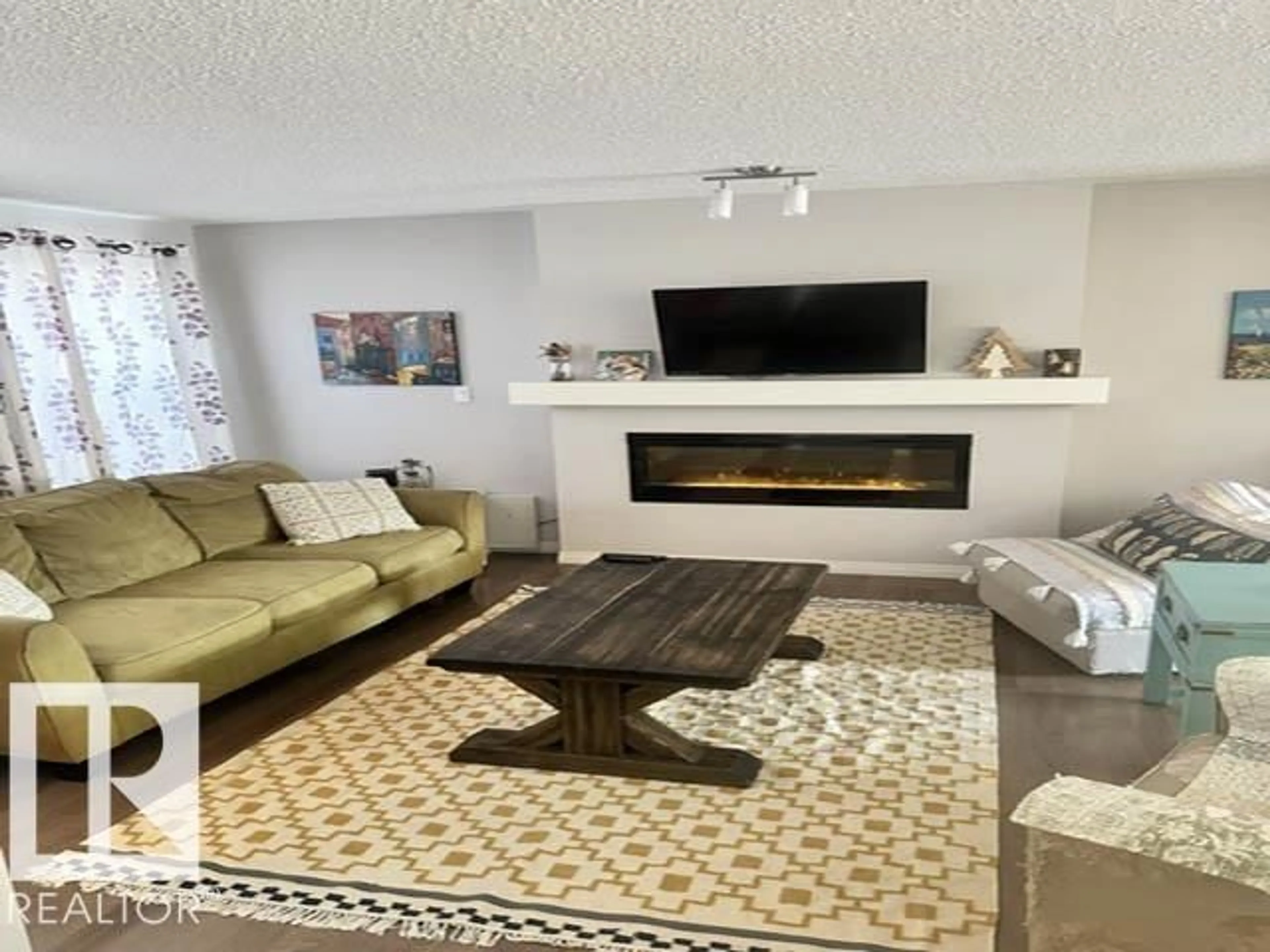 Living room with furniture, unknown for 8323 ELISS CRESCENT, Edmonton Alberta T6M0P8
