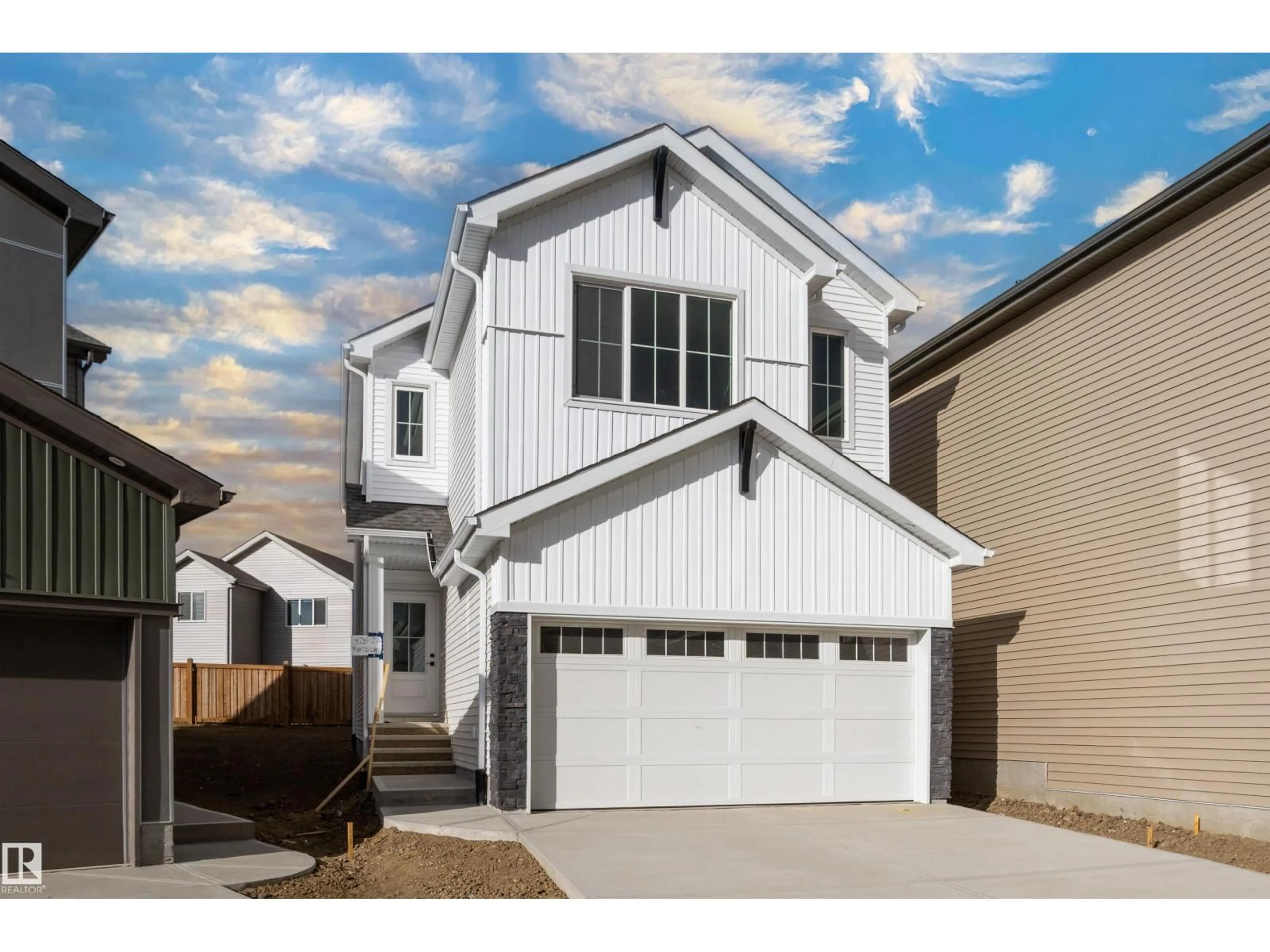 Home with vinyl exterior material, street for SW - 428 27 ST, Edmonton Alberta T6X3H9