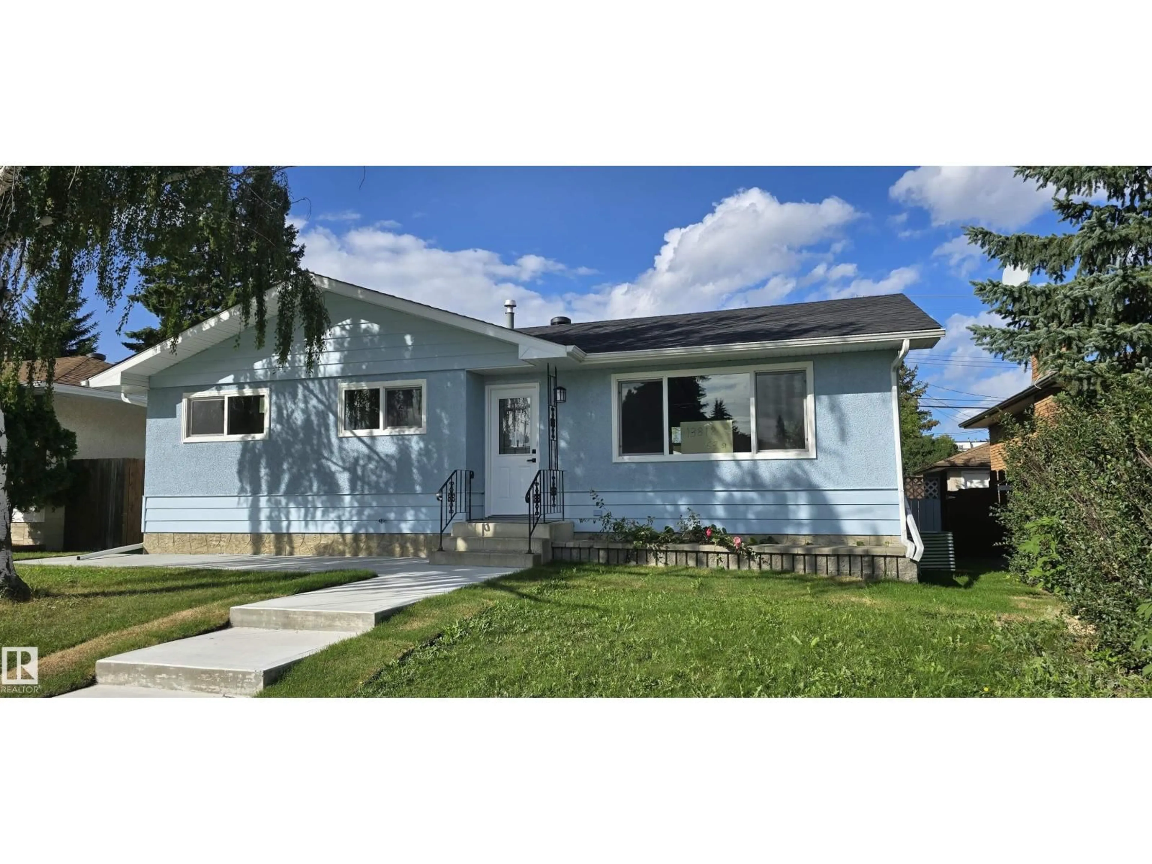 Home with vinyl exterior material, street for NW - 13812 63 ST, Edmonton Alberta T5A1R3