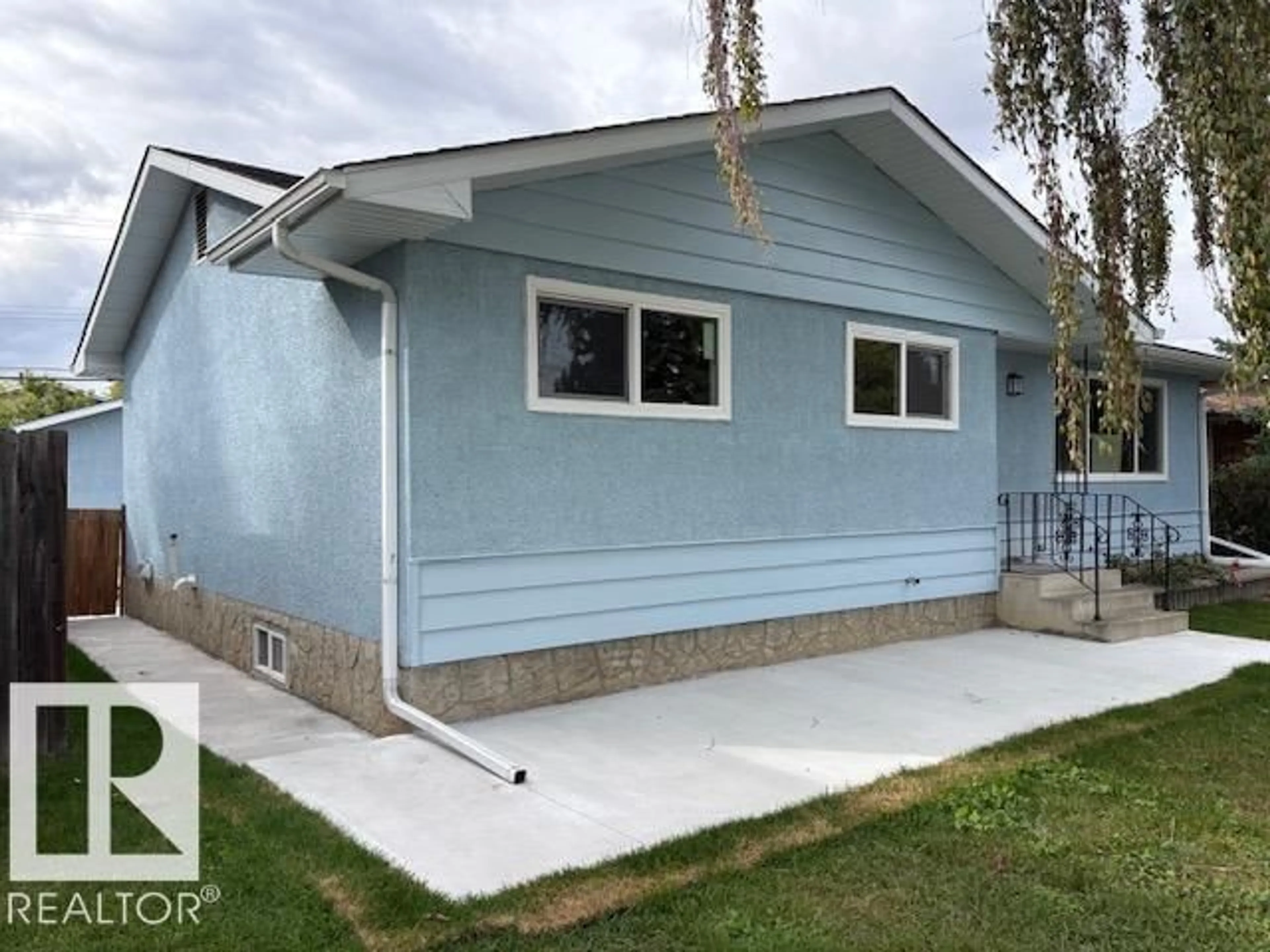 Home with vinyl exterior material, street for NW - 13812 63 ST, Edmonton Alberta T5A1R3