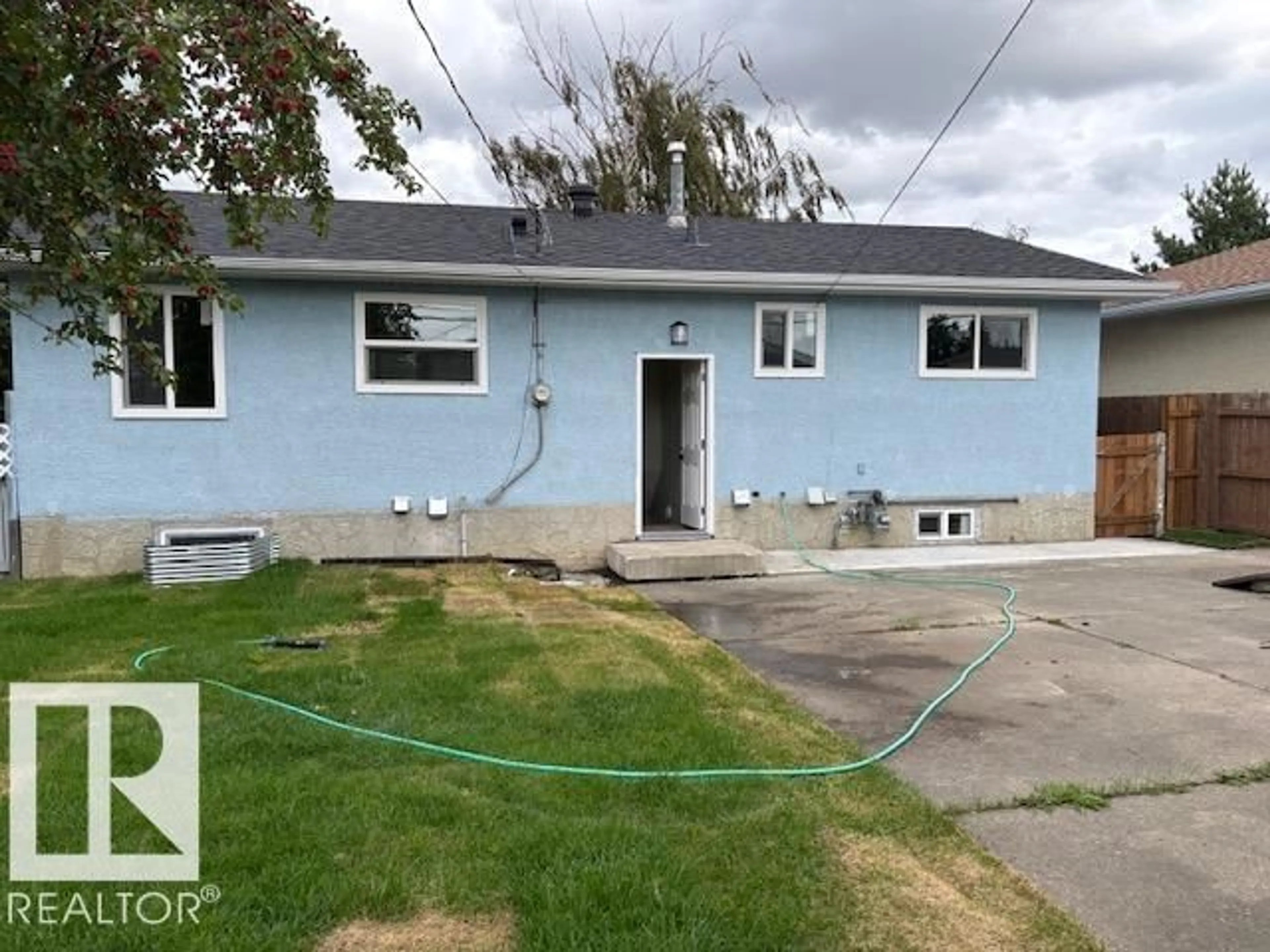 Home with vinyl exterior material, street for NW - 13812 63 ST, Edmonton Alberta T5A1R3