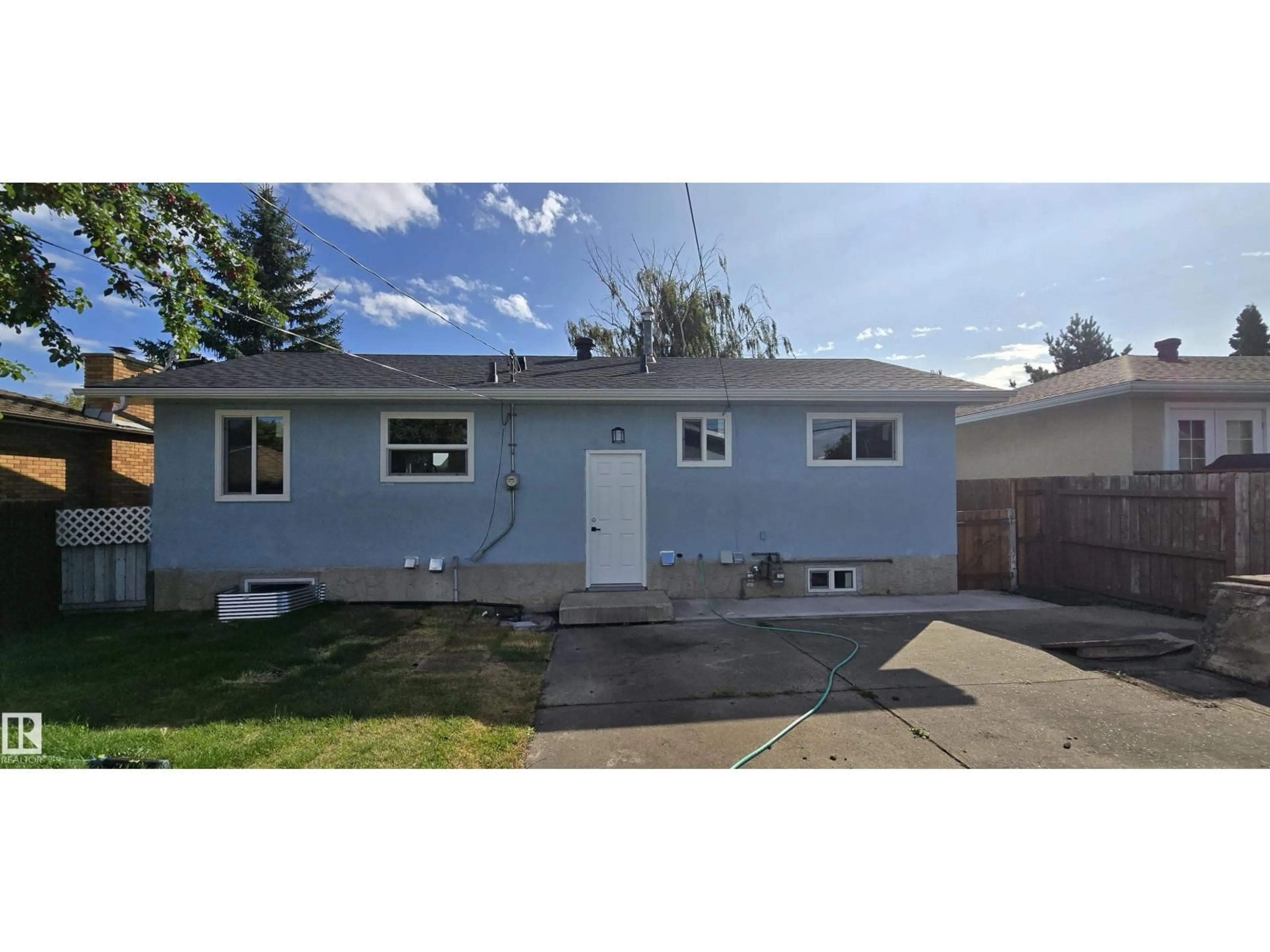 Home with vinyl exterior material, street for NW - 13812 63 ST, Edmonton Alberta T5A1R3