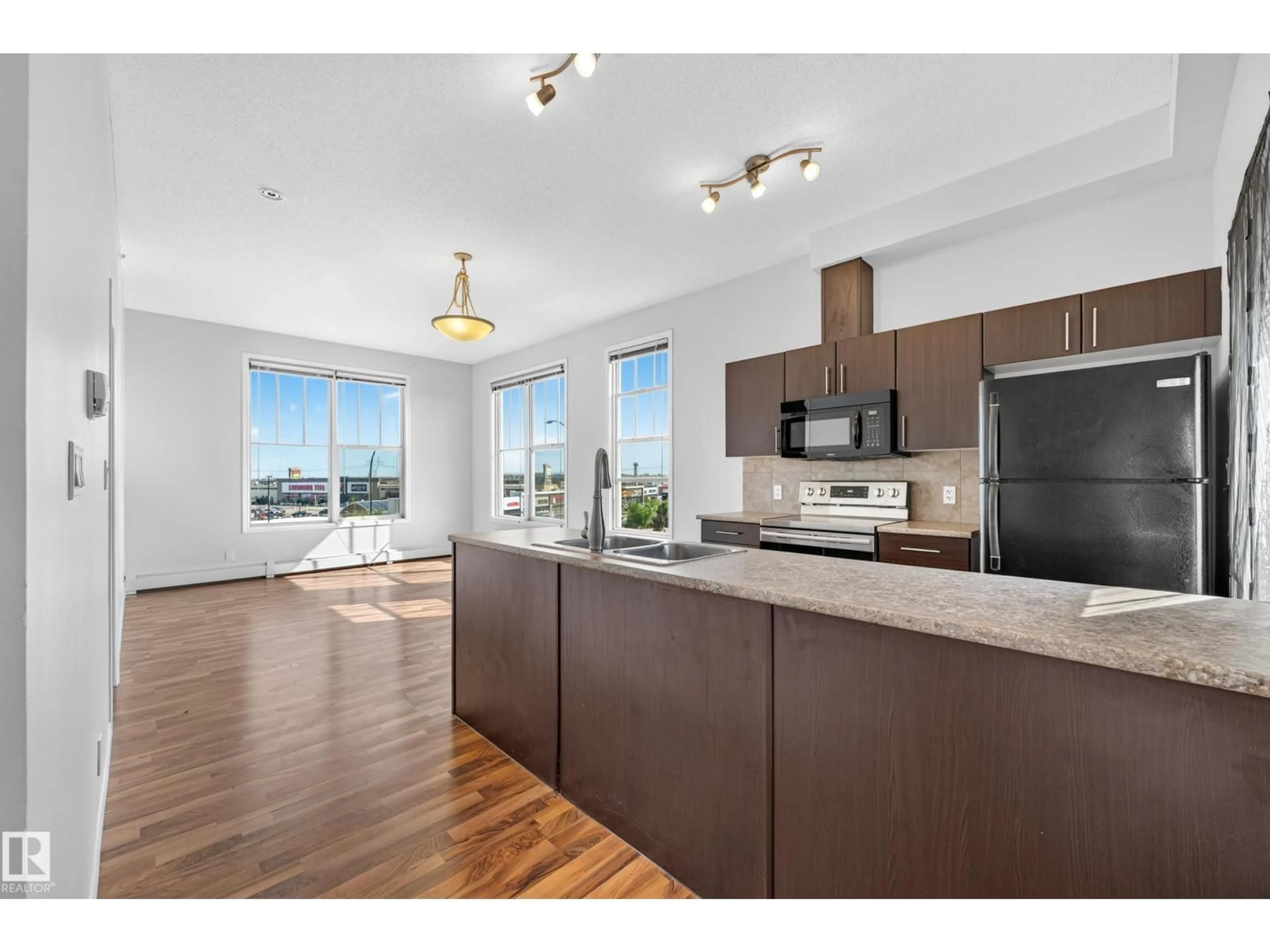 Open concept kitchen, unknown for #406 - 105 AMBLESIDE DR, Edmonton Alberta T6W0J4