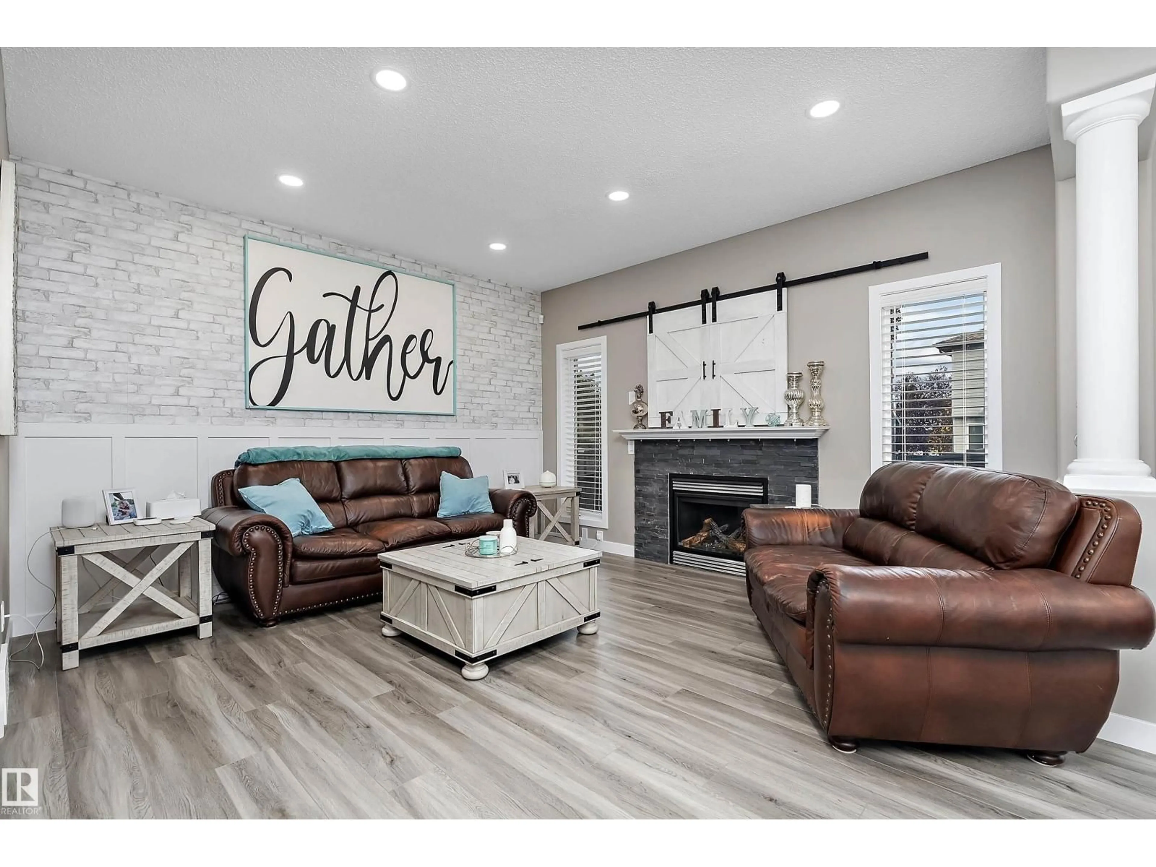 Living room with furniture, wood/laminate floor for 47 BIRCHMONT DR, Leduc Alberta T9E8S4