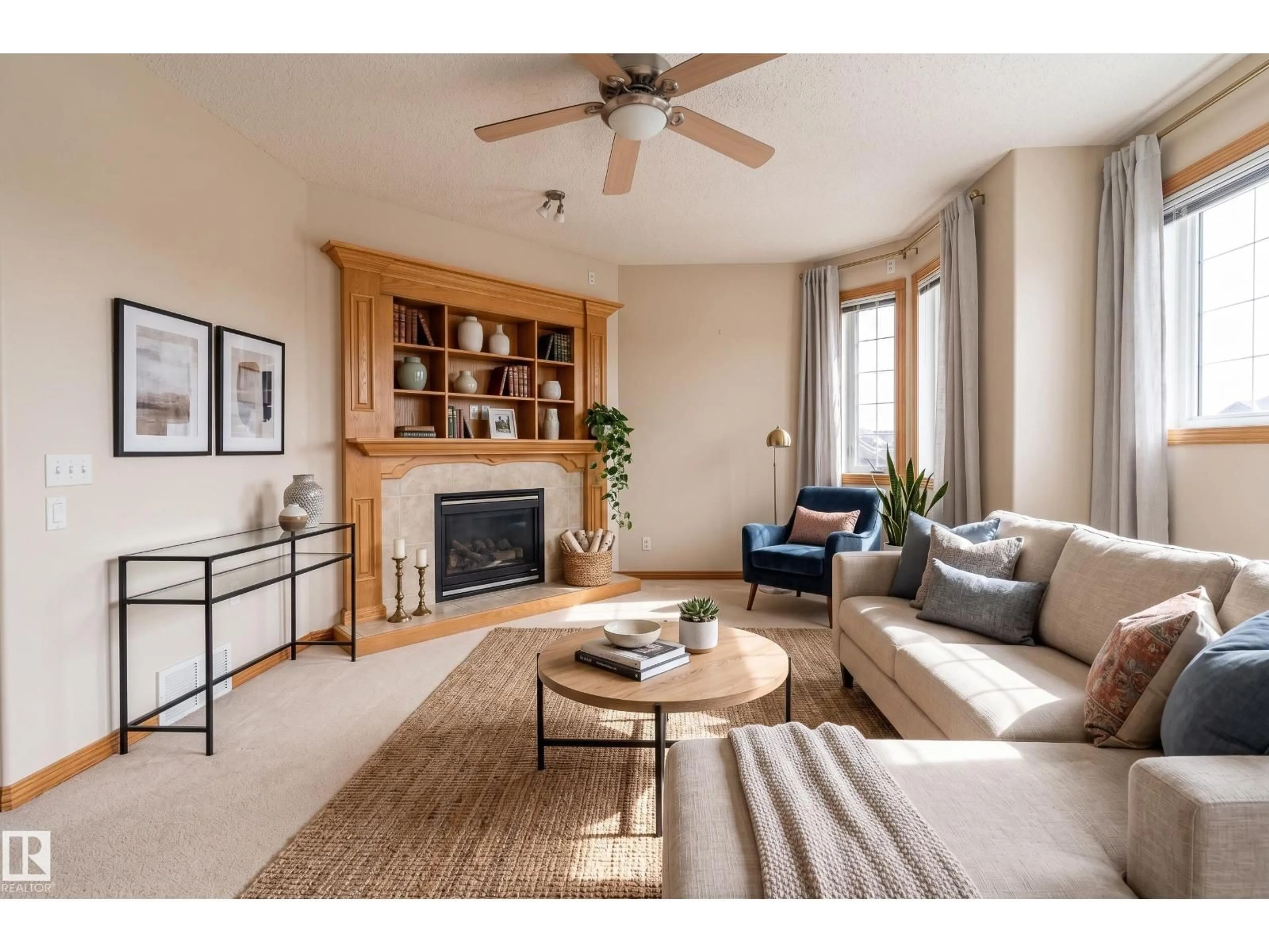 Living room with furniture, wood/laminate floor for NW - 10820 178 AV, Edmonton Alberta T5X6H6