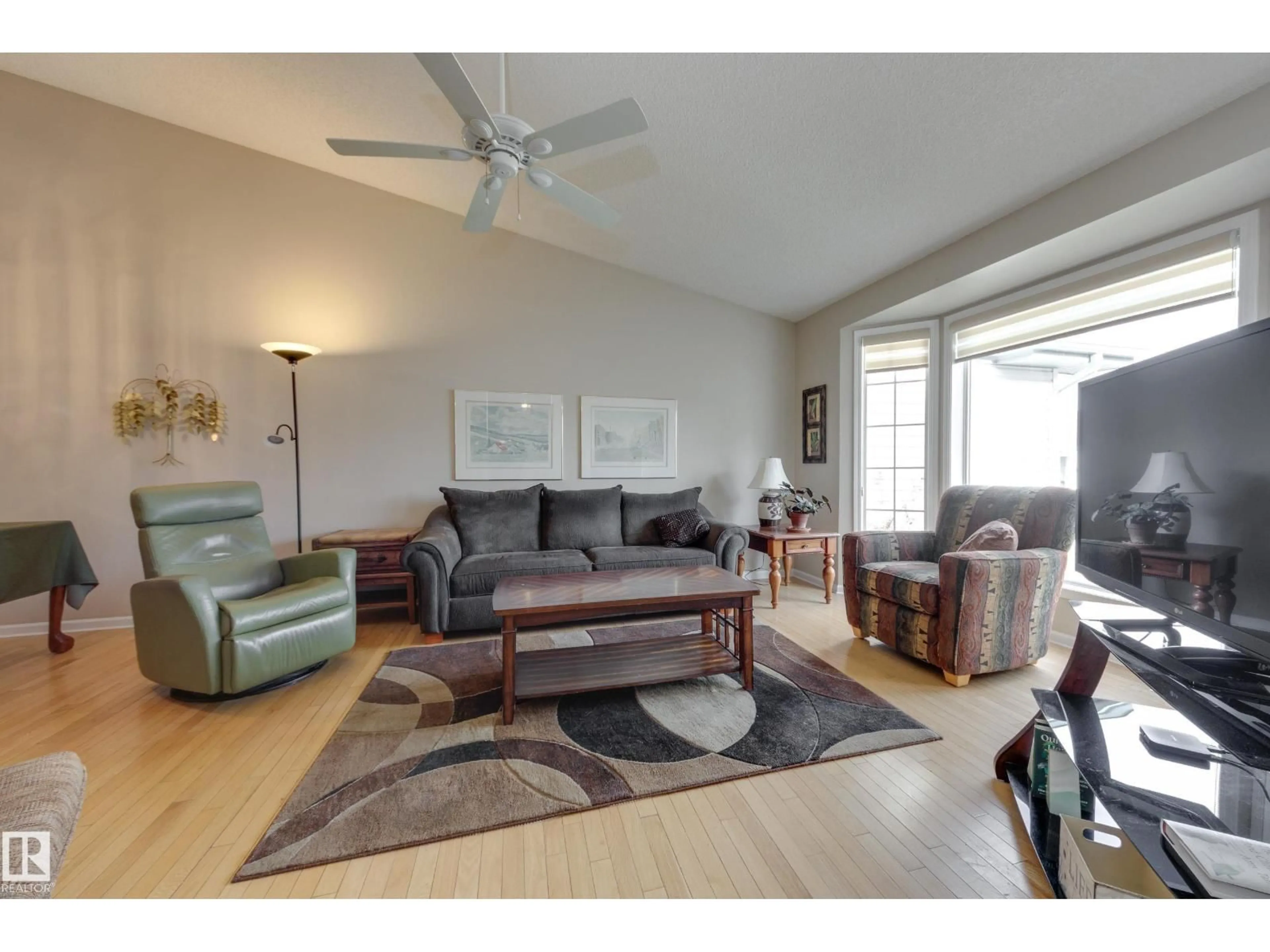 Living room with furniture, wood/laminate floor for #39 - 308 JACKSON RD, Edmonton Alberta T6L6W1