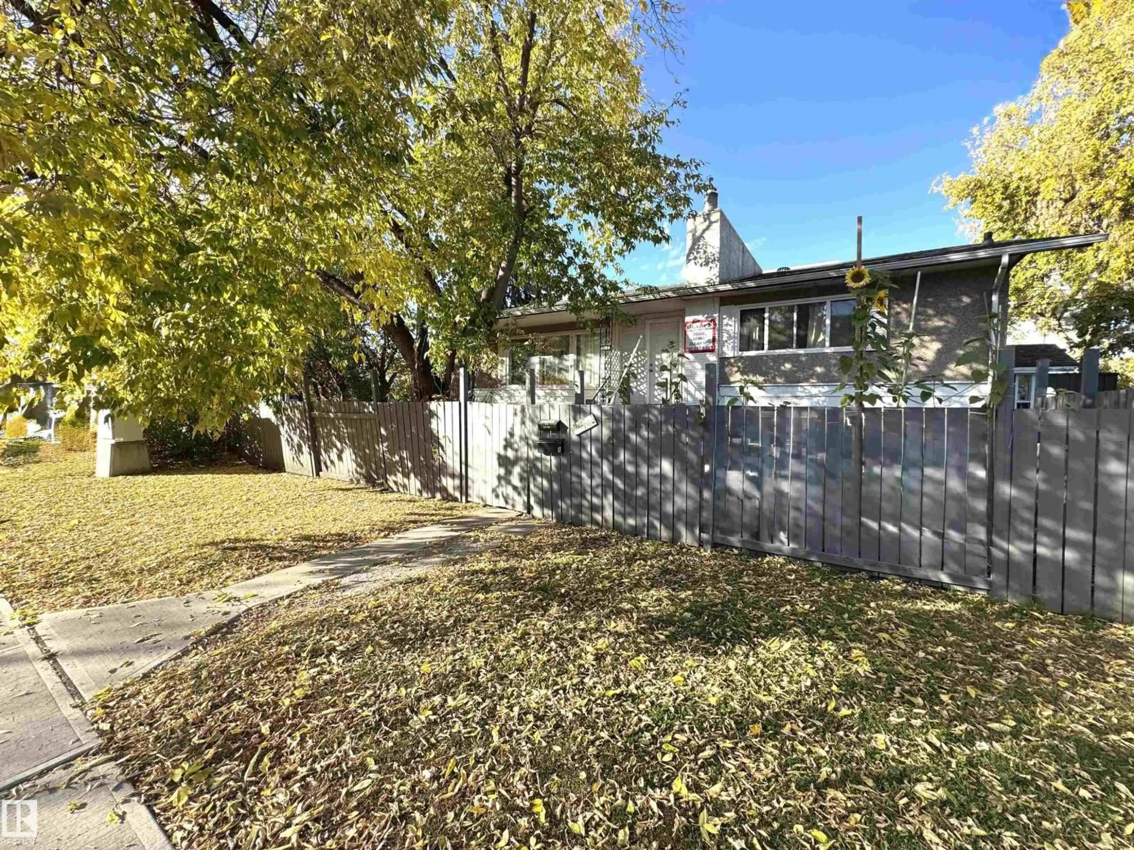 A pic from outside/outdoor area/front of a property/back of a property/a pic from drone, street for 8108 124 AV, Edmonton Alberta T5B1C1