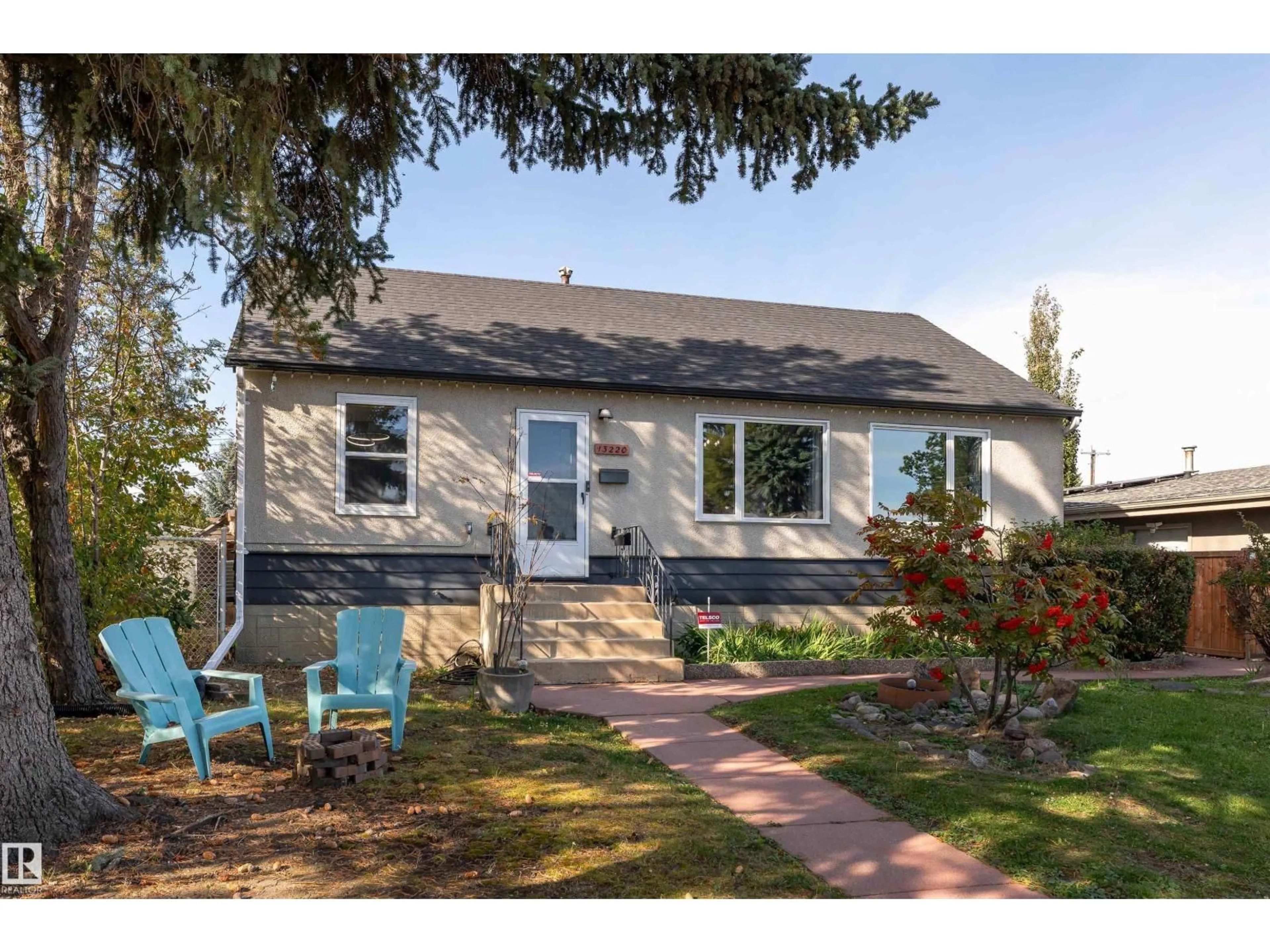 Home with vinyl exterior material, street for 13220 77 ST, Edmonton Alberta T5C1C9