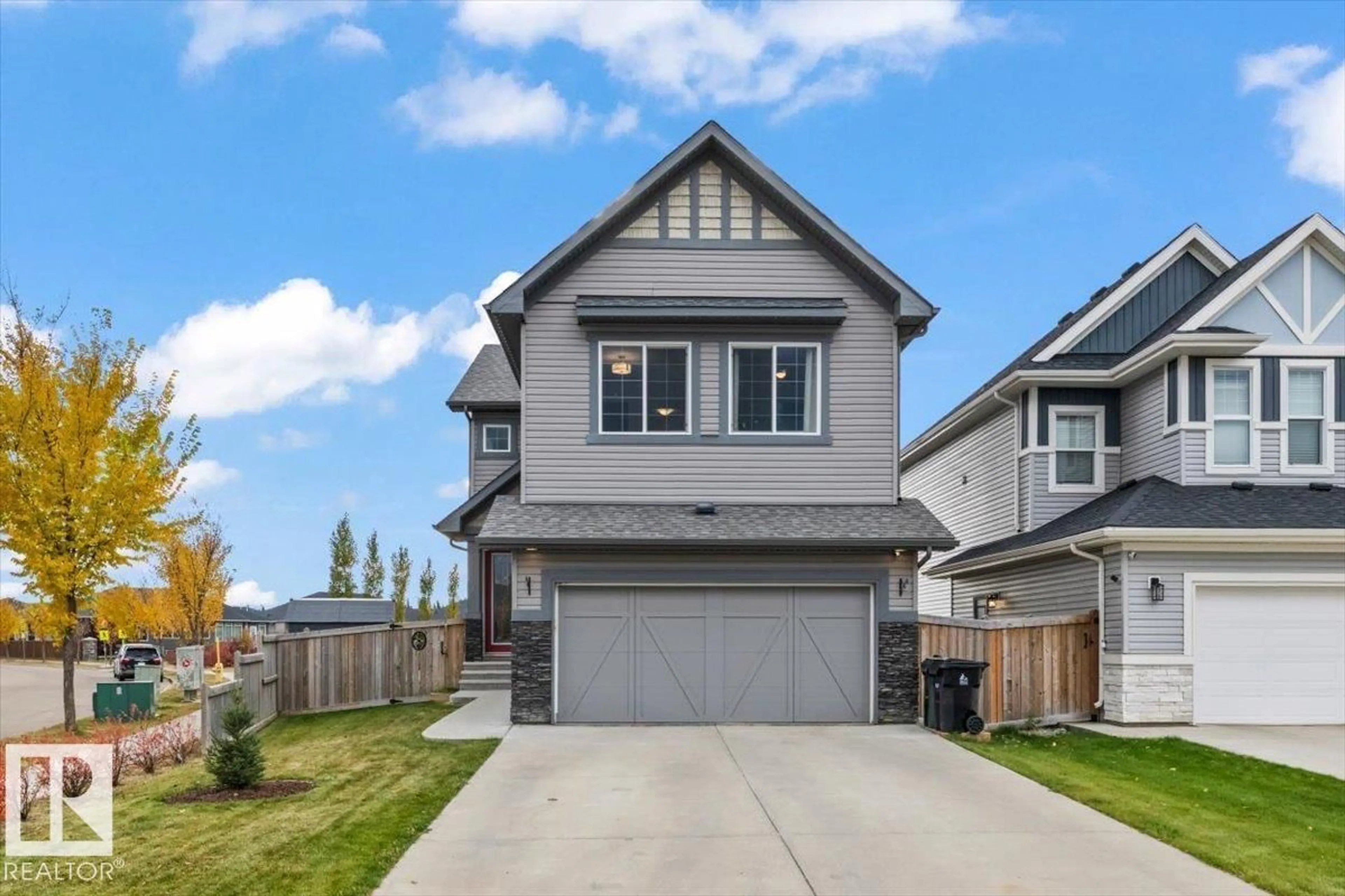 Home with vinyl exterior material, street for 1 HILTON CV, Spruce Grove Alberta T7X0V9