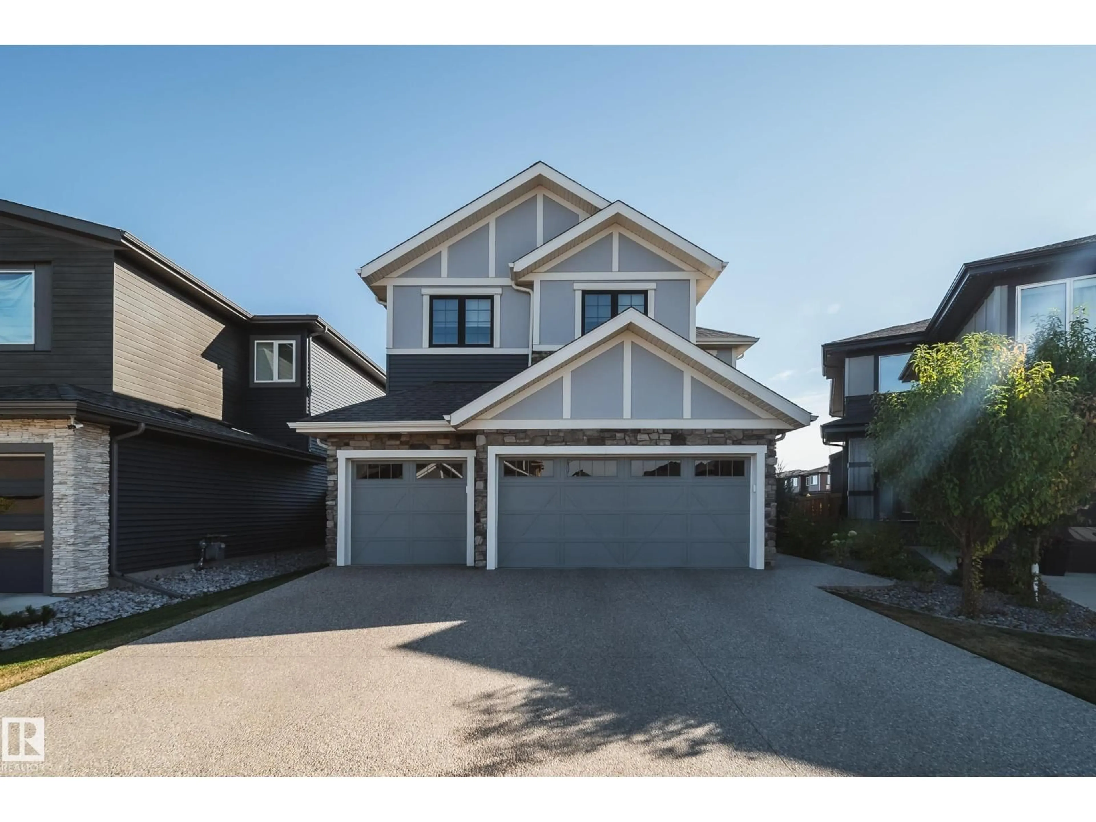 Home with vinyl exterior material, street for SW - 6843 KNOX LO, Edmonton Alberta T6W4R4
