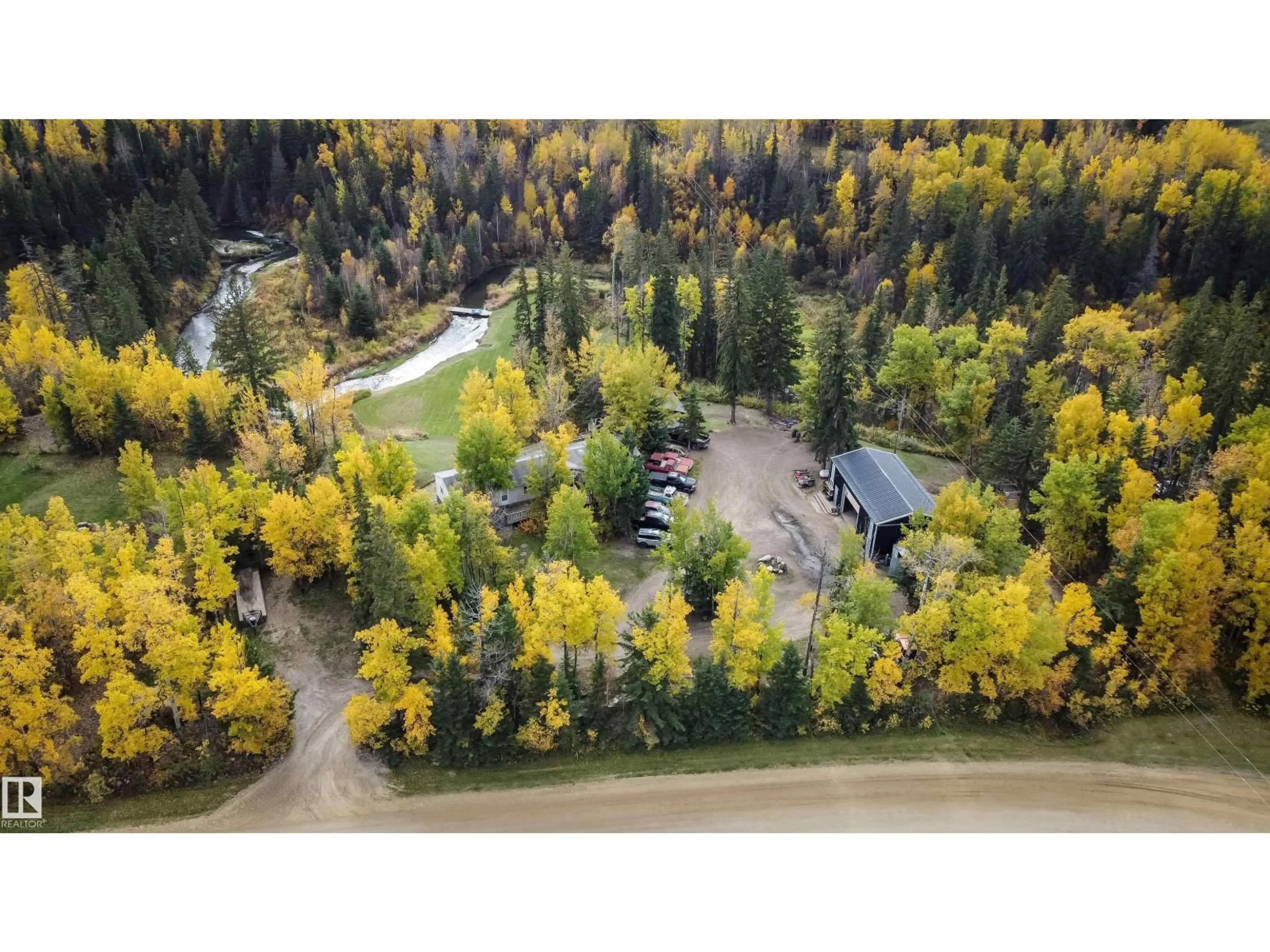 A pic from outside/outdoor area/front of a property/back of a property/a pic from drone, forest/trees view for 2331 TWP ROAD 552, Rural Lac Ste. Anne County Alberta T0E1A0