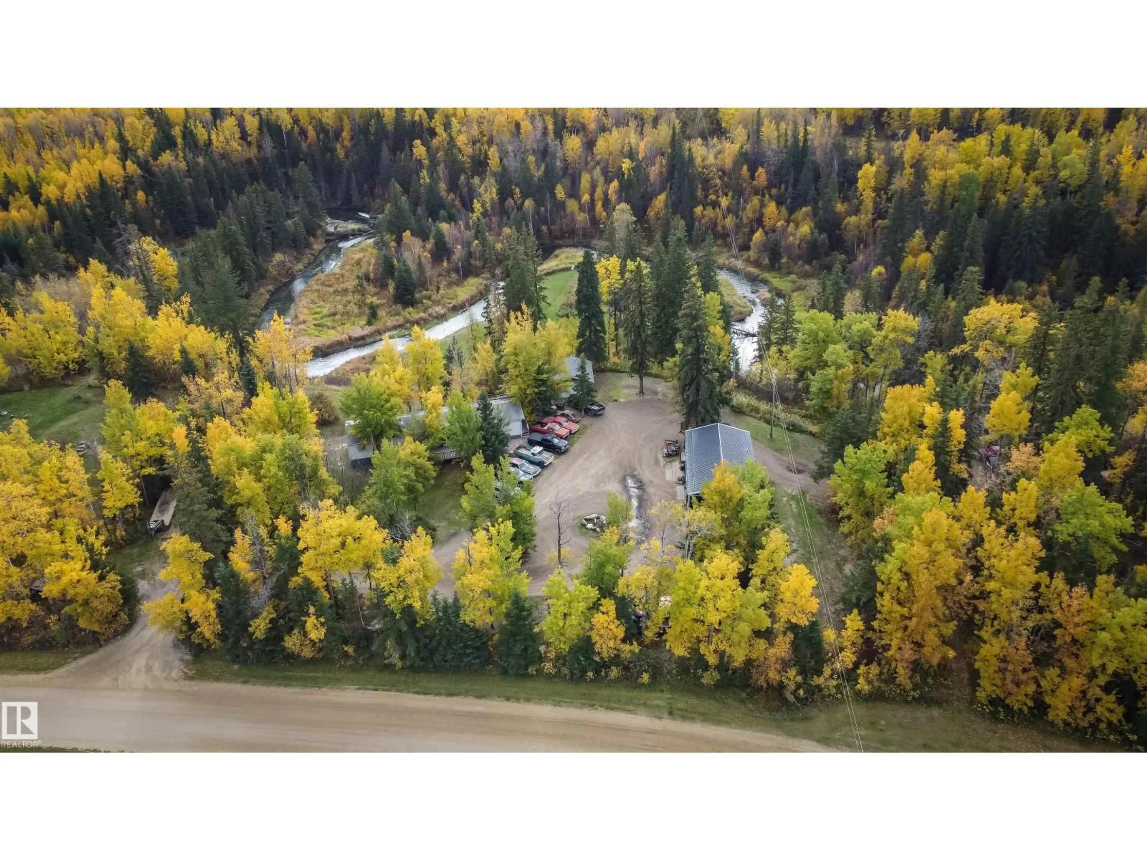 A pic from outside/outdoor area/front of a property/back of a property/a pic from drone, forest/trees view for 2331 TWP ROAD 552, Rural Lac Ste. Anne County Alberta T0E1A0