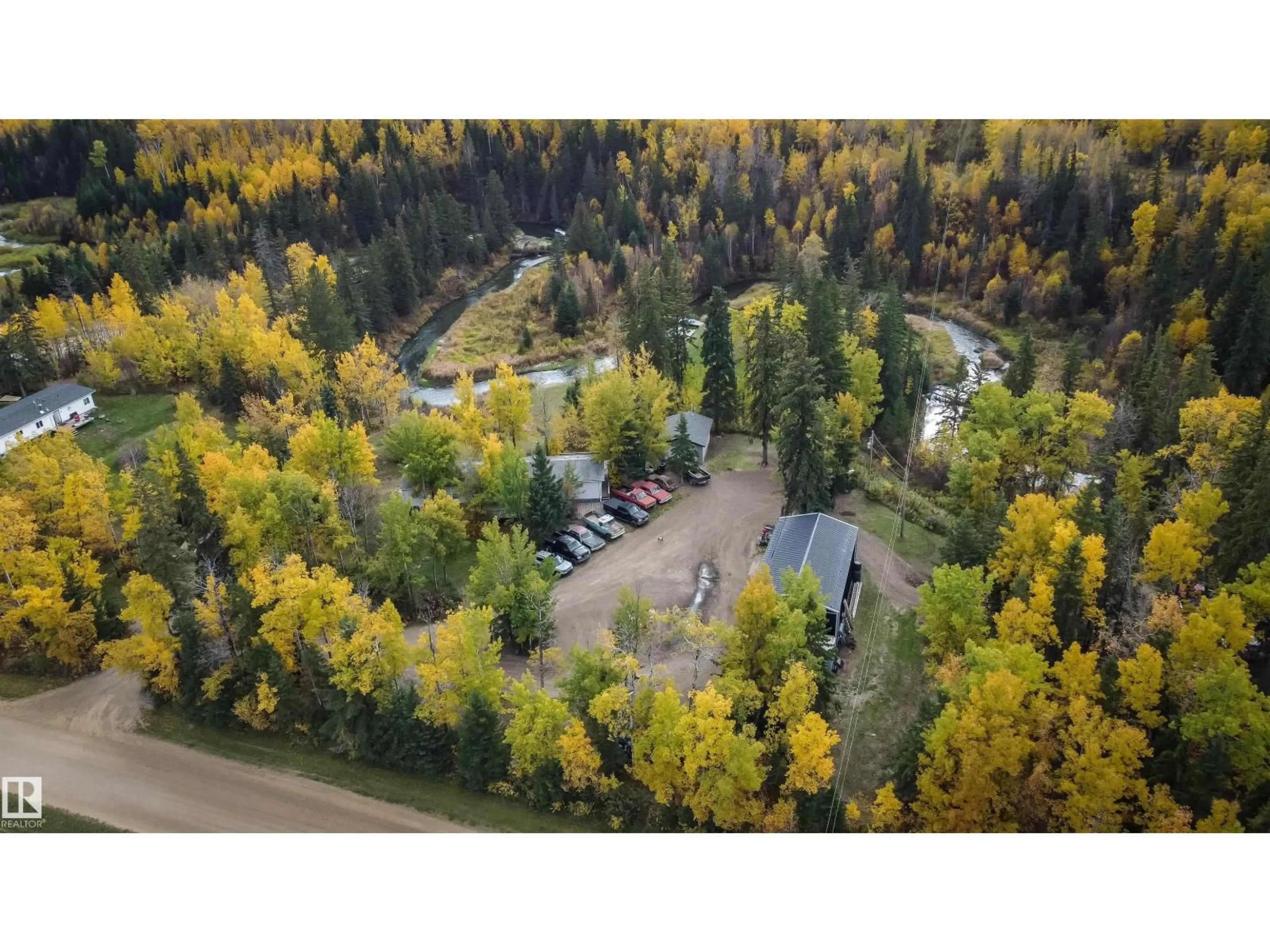 A pic from outside/outdoor area/front of a property/back of a property/a pic from drone, forest/trees view for 2331 TWP ROAD 552, Rural Lac Ste. Anne County Alberta T0E1A0