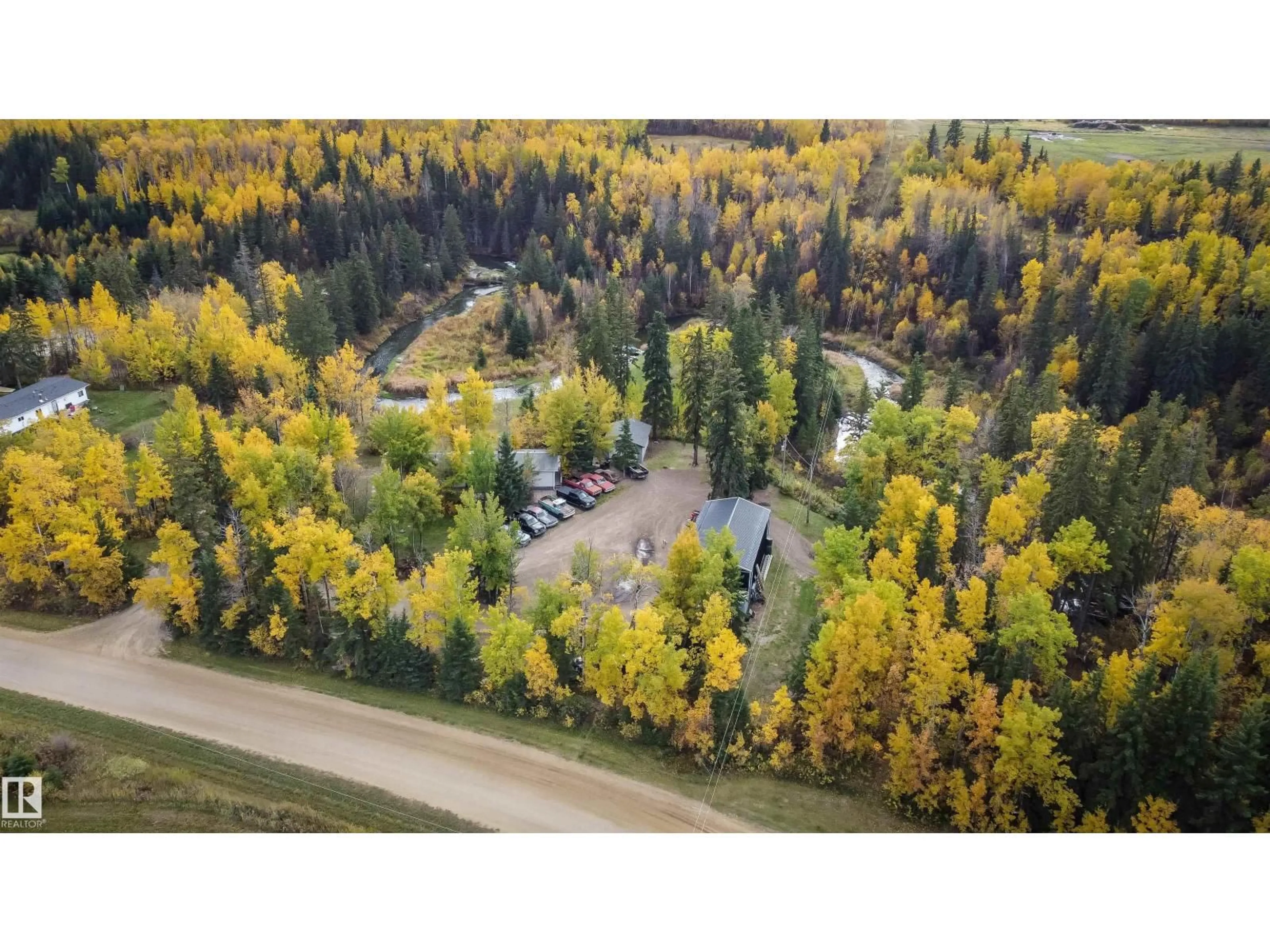 A pic from outside/outdoor area/front of a property/back of a property/a pic from drone, forest/trees view for 2331 TWP ROAD 552, Rural Lac Ste. Anne County Alberta T0E1A0