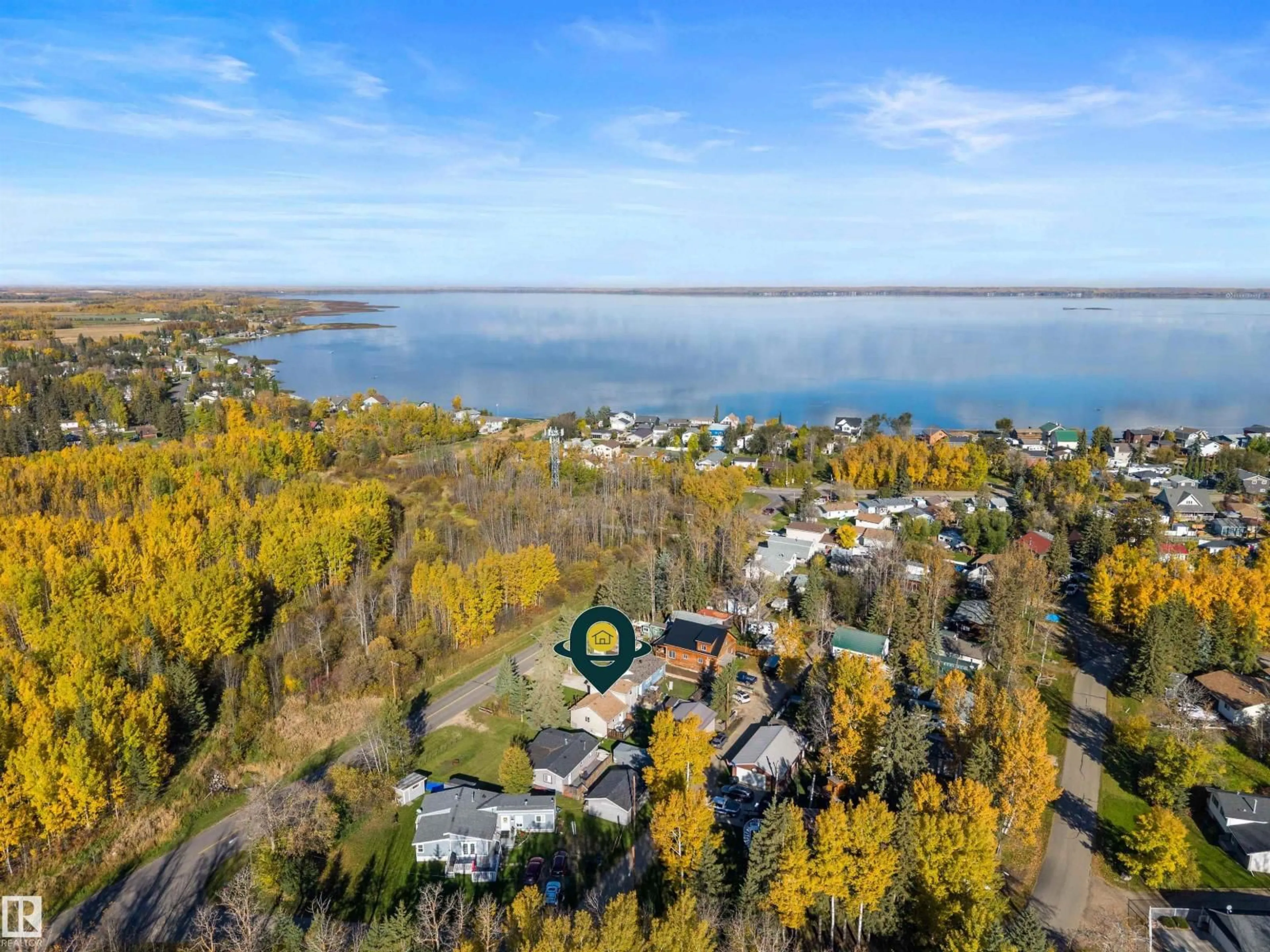 A pic from outside/outdoor area/front of a property/back of a property/a pic from drone, water/lake/river/ocean view for 4811 60 ST, Rural Lac Ste. Anne County Alberta T9E0A0