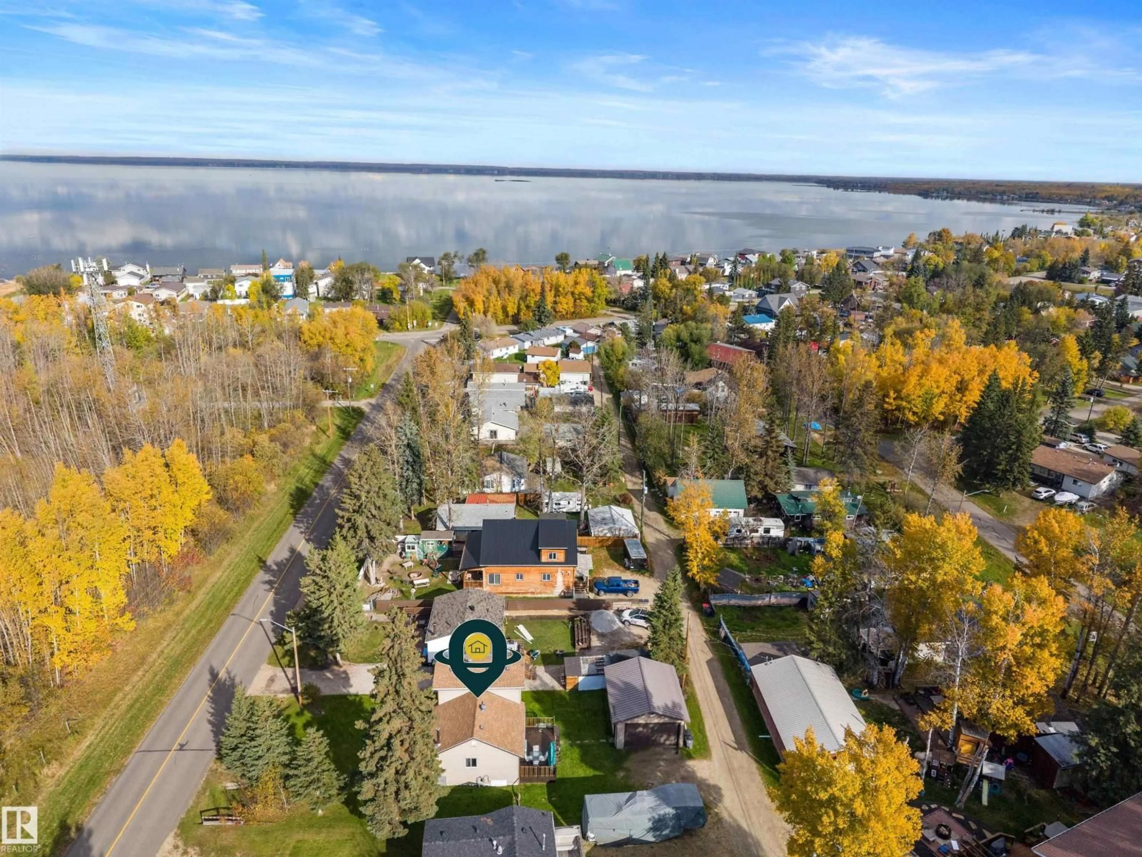 A pic from outside/outdoor area/front of a property/back of a property/a pic from drone, water/lake/river/ocean view for 4811 60 ST, Rural Lac Ste. Anne County Alberta T9E0A0