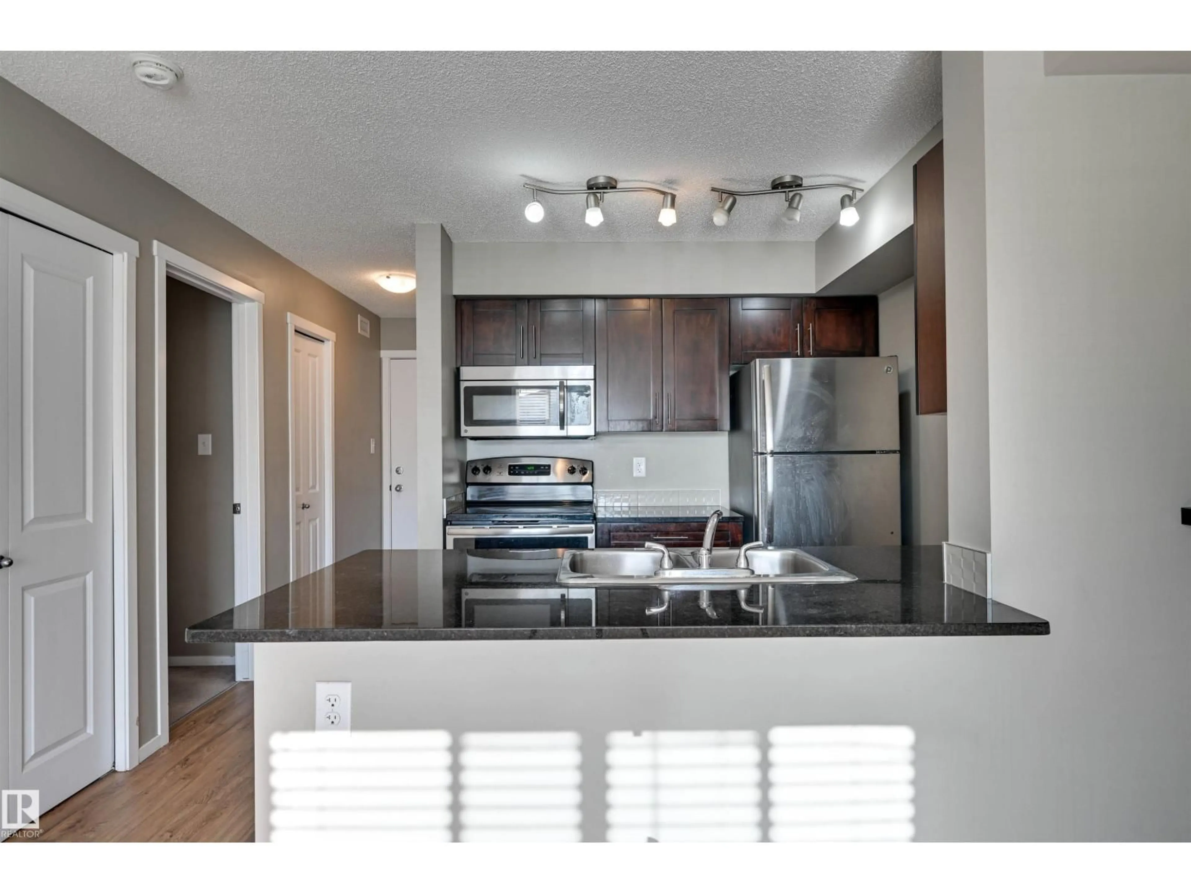 Open concept kitchen, unknown for 319 18126 77 ST NW, Edmonton Alberta T5Z0N7