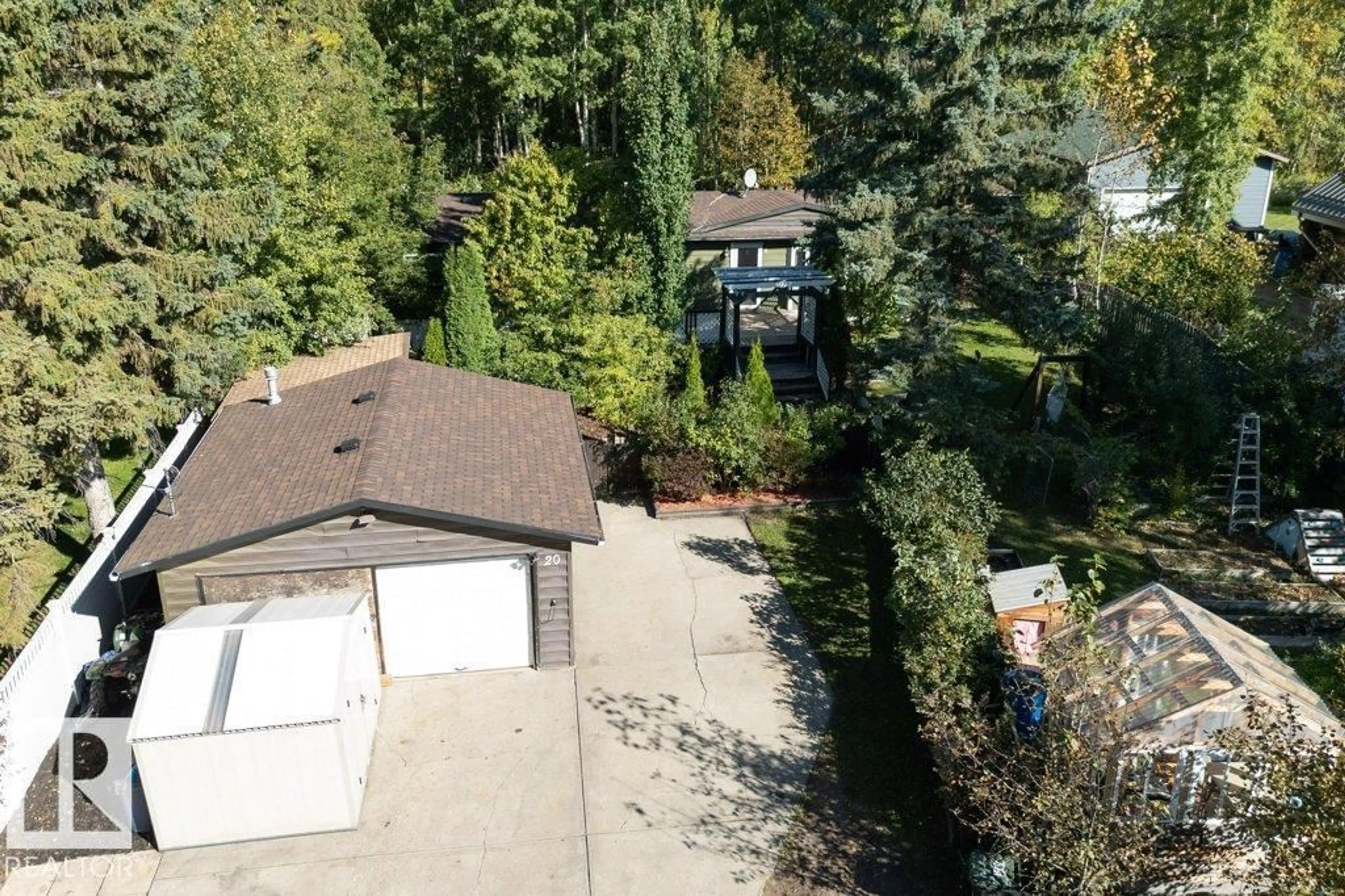 A pic from outside/outdoor area/front of a property/back of a property/a pic from drone, forest/trees view for 52059 - 20 RGE ROAD 220, Rural Strathcona County Alberta T8E1B9