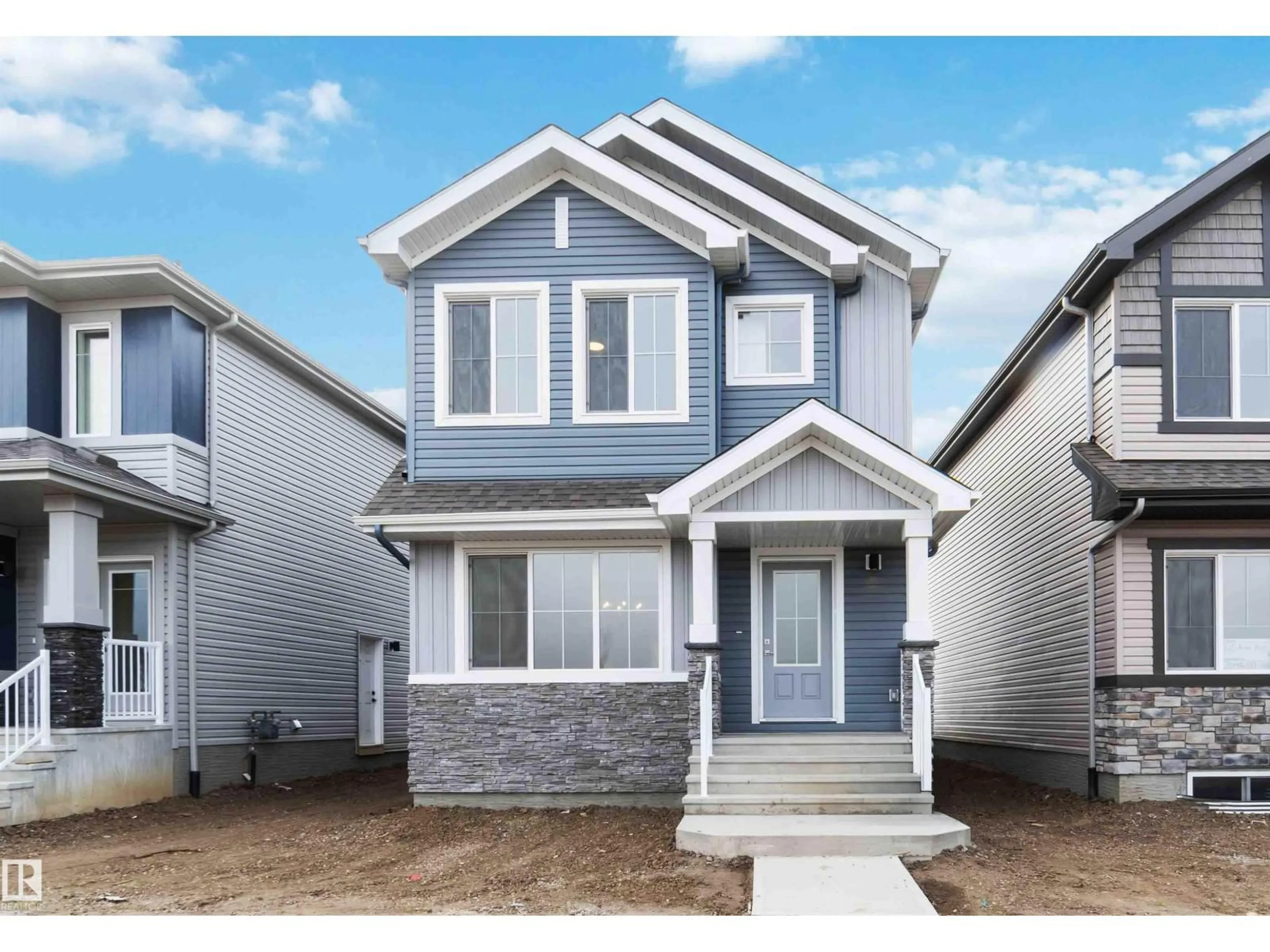 Home with vinyl exterior material, street for 1013 ASTER BV, Edmonton Alberta T6T2W8