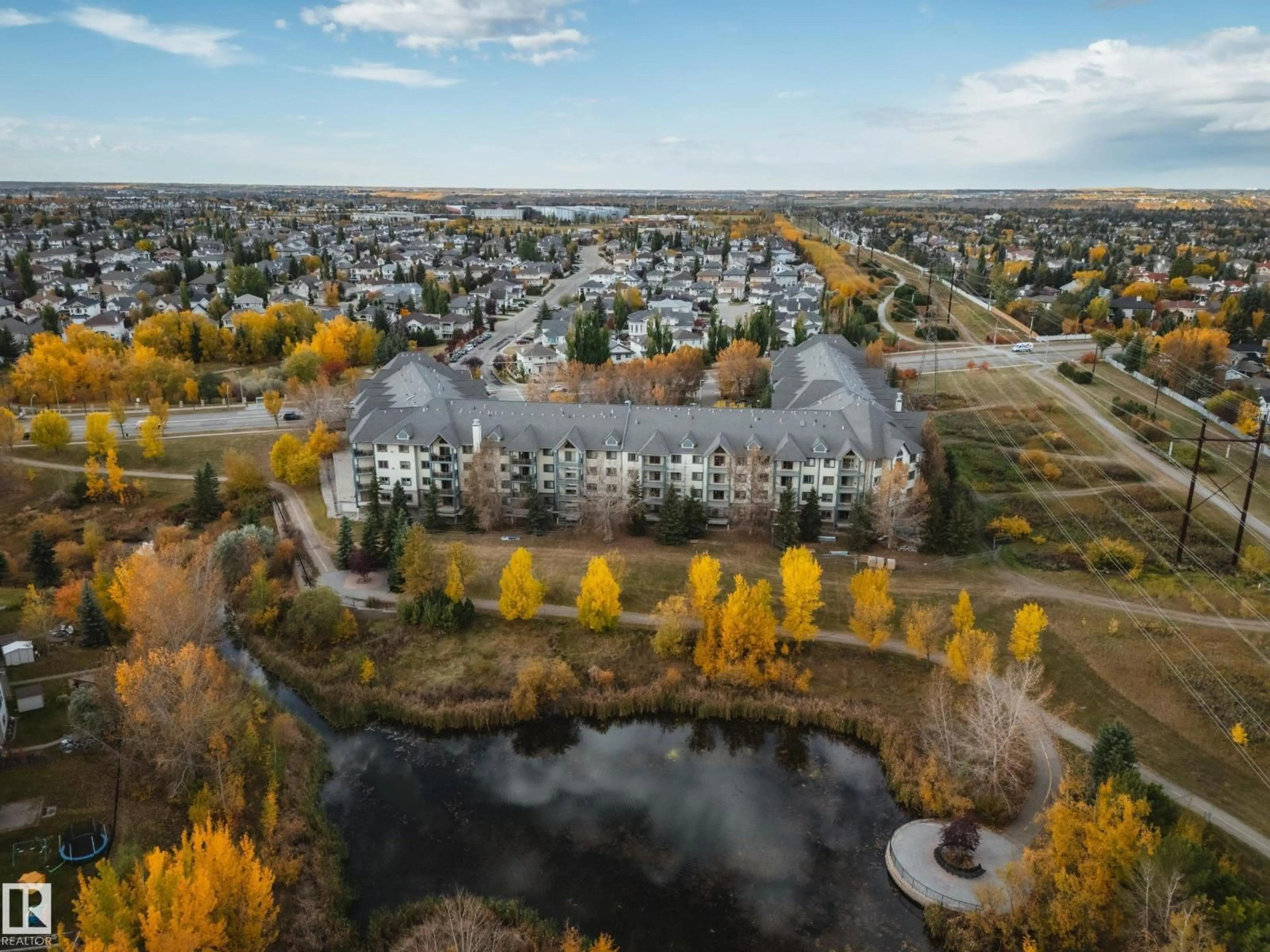 A pic from outside/outdoor area/front of a property/back of a property/a pic from drone, water/lake/river/ocean view for #434 - 2903 RABBIT HILL RD, Edmonton Alberta T6R3A3
