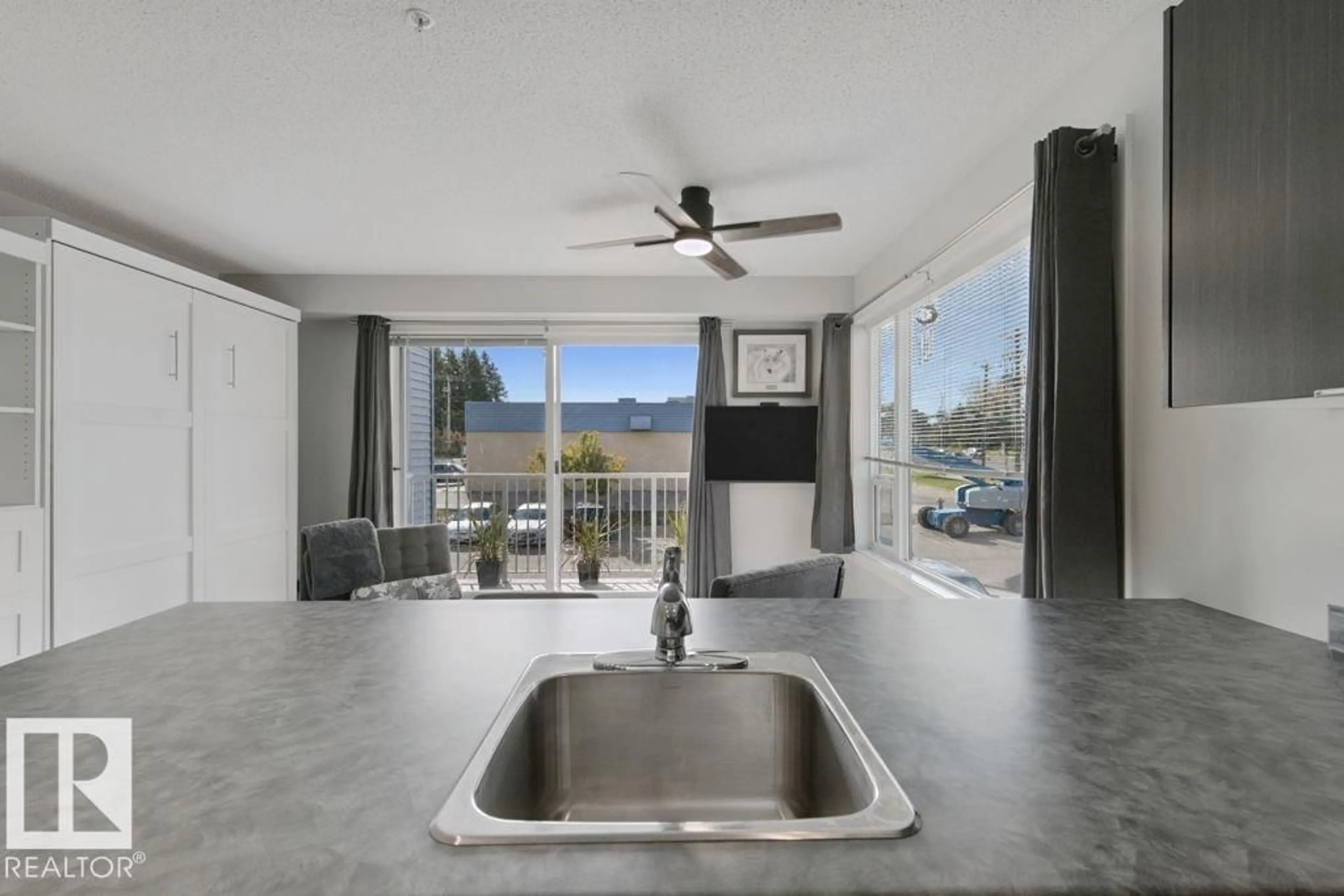 Open concept kitchen, cement floor for #217 - 610 CALAHOO RD, Spruce Grove Alberta T7X2A7