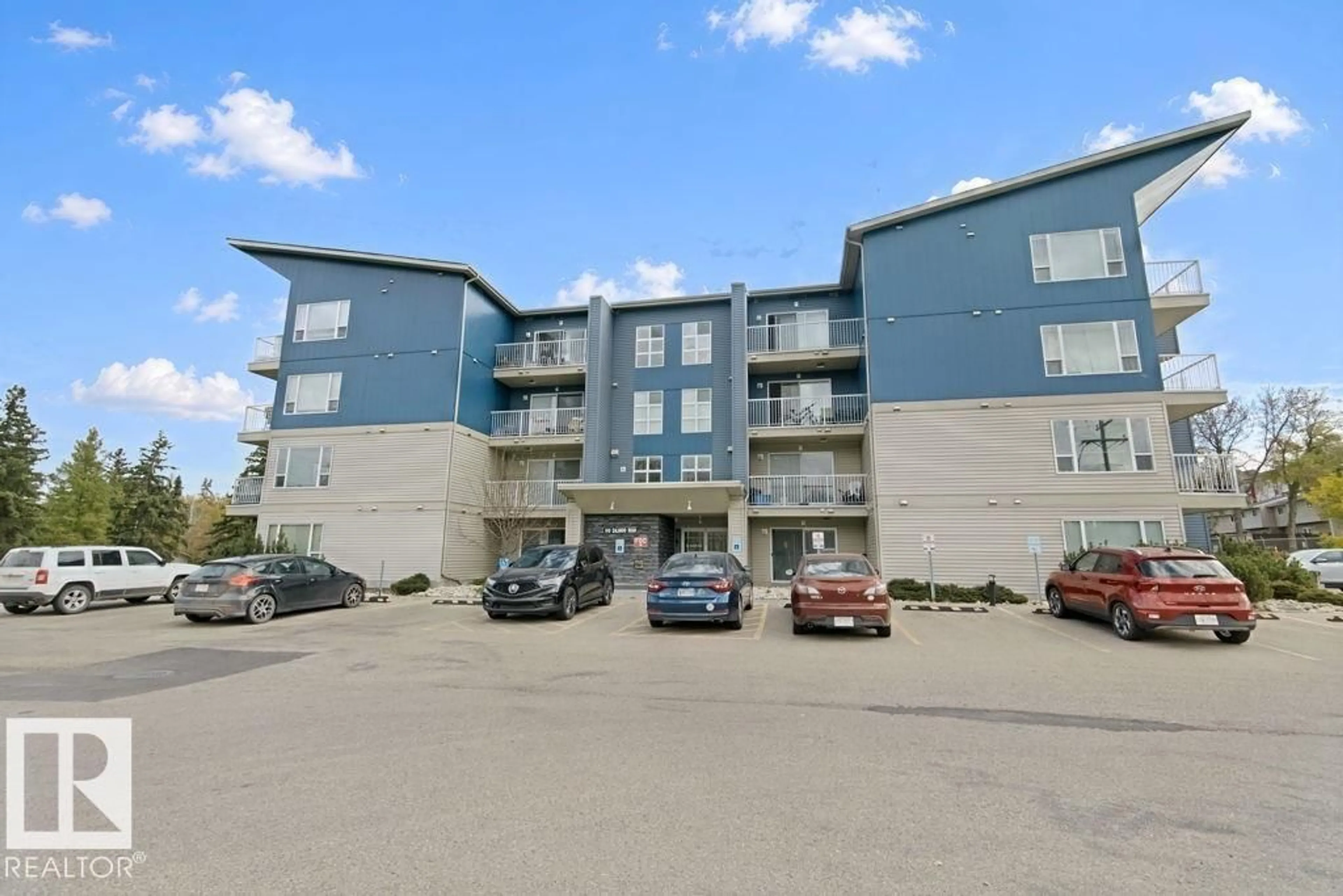A pic from outside/outdoor area/front of a property/back of a property/a pic from drone, unknown for #217 - 610 CALAHOO RD, Spruce Grove Alberta T7X2A7