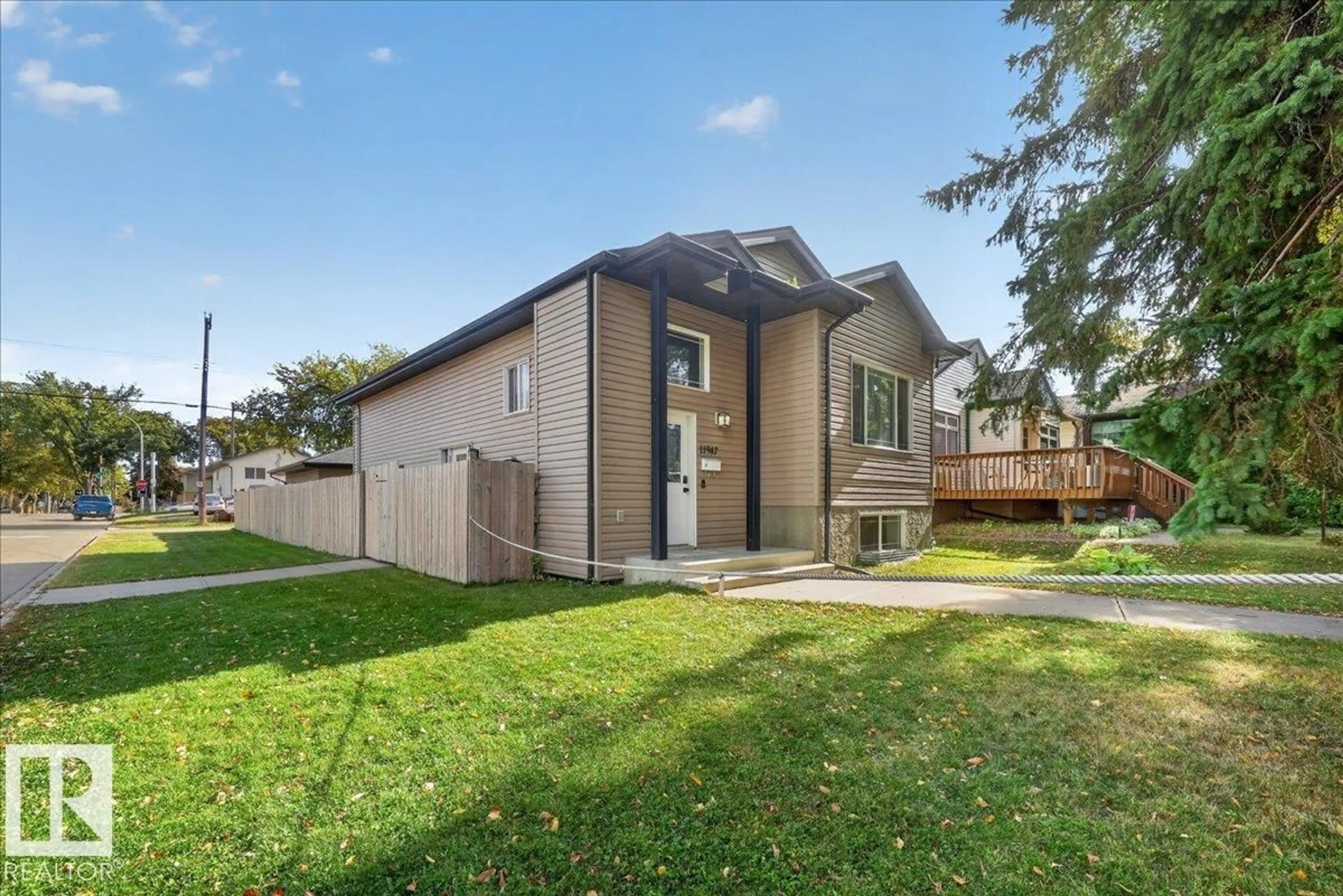 Home with vinyl exterior material, street for NW - 11947 67 ST, Edmonton Alberta T5B1M2