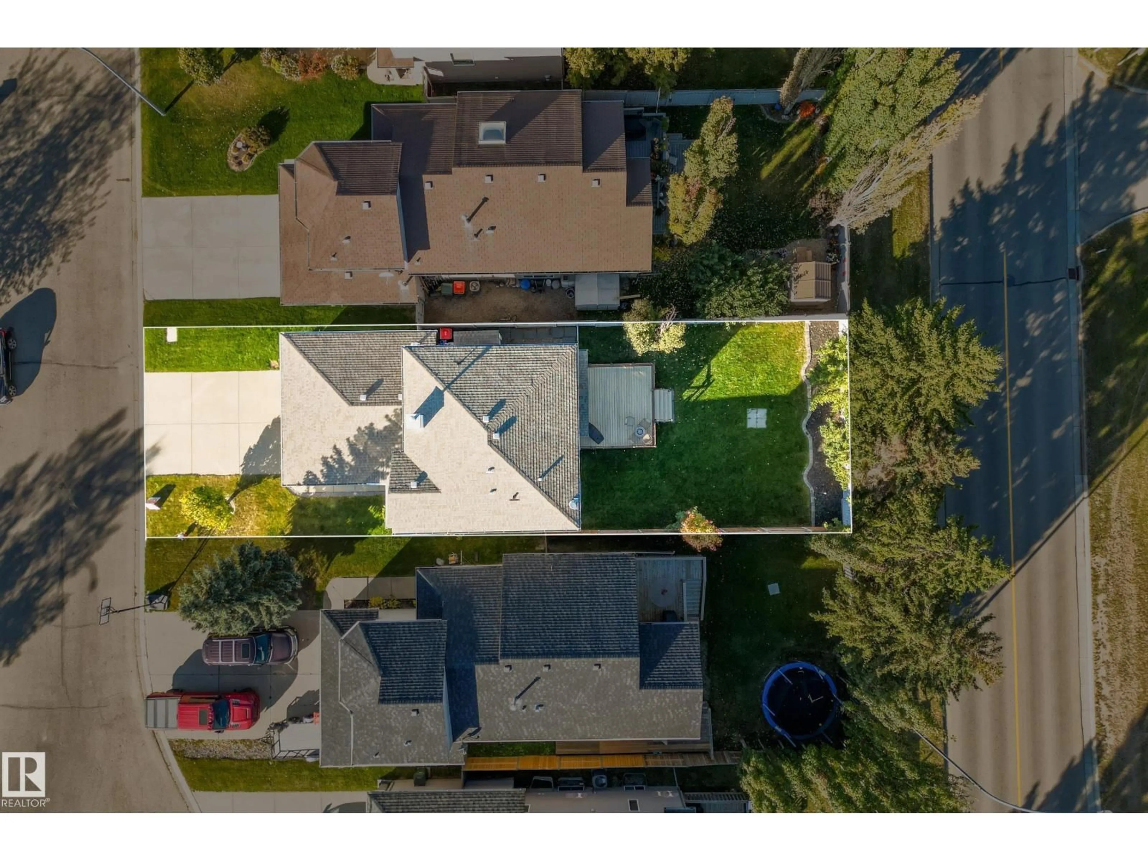 A pic from outside/outdoor area/front of a property/back of a property/a pic from drone, street for 52 HARMONY CR, Stony Plain Alberta T7Z2S3