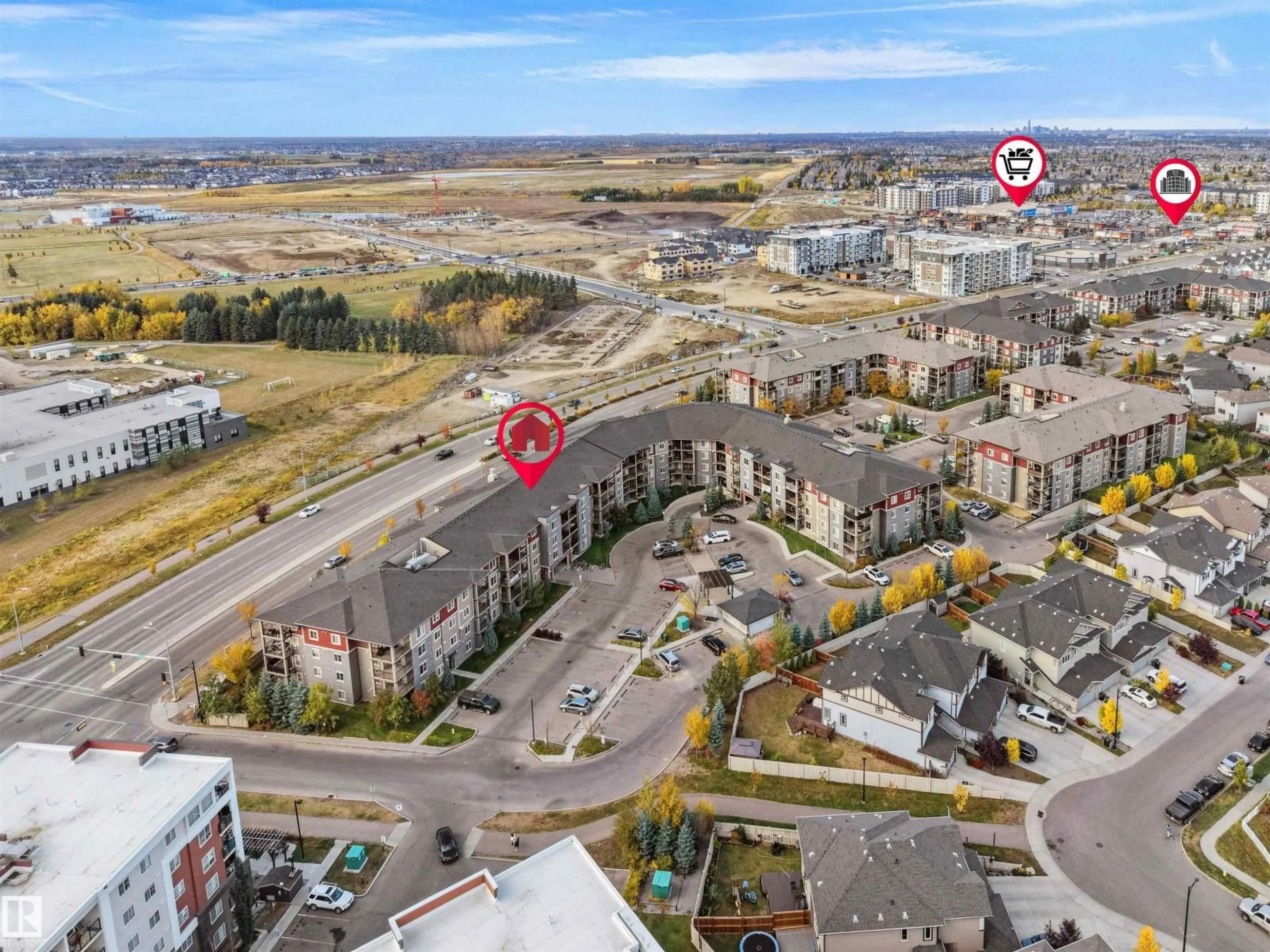 A pic from outside/outdoor area/front of a property/back of a property/a pic from drone, unknown for #119 - 3315 JAMES MOWATT TR, Edmonton Alberta T6W3L9