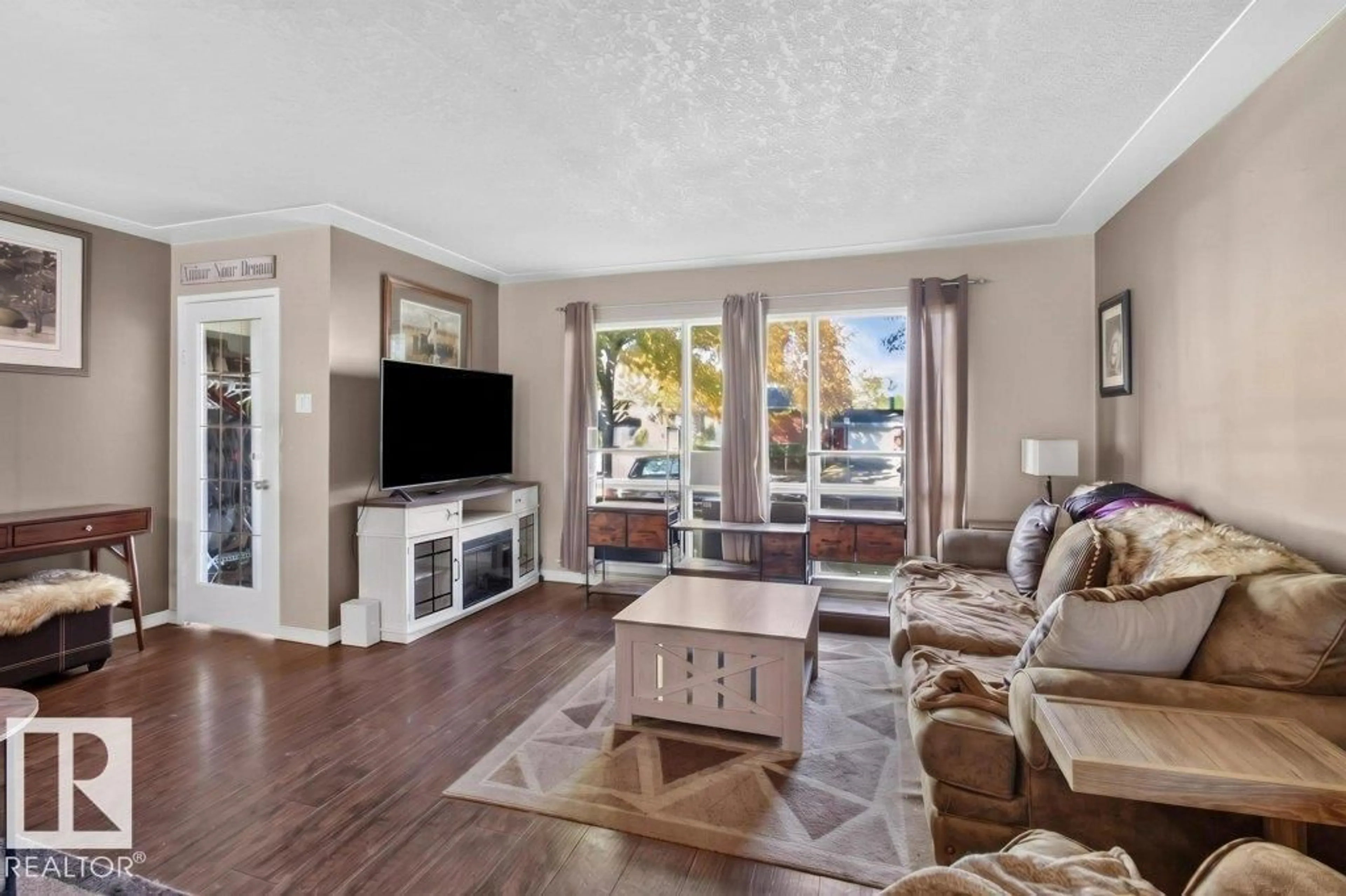 Living room with furniture, unknown for 3829 110 AV, Edmonton Alberta T5W0H8