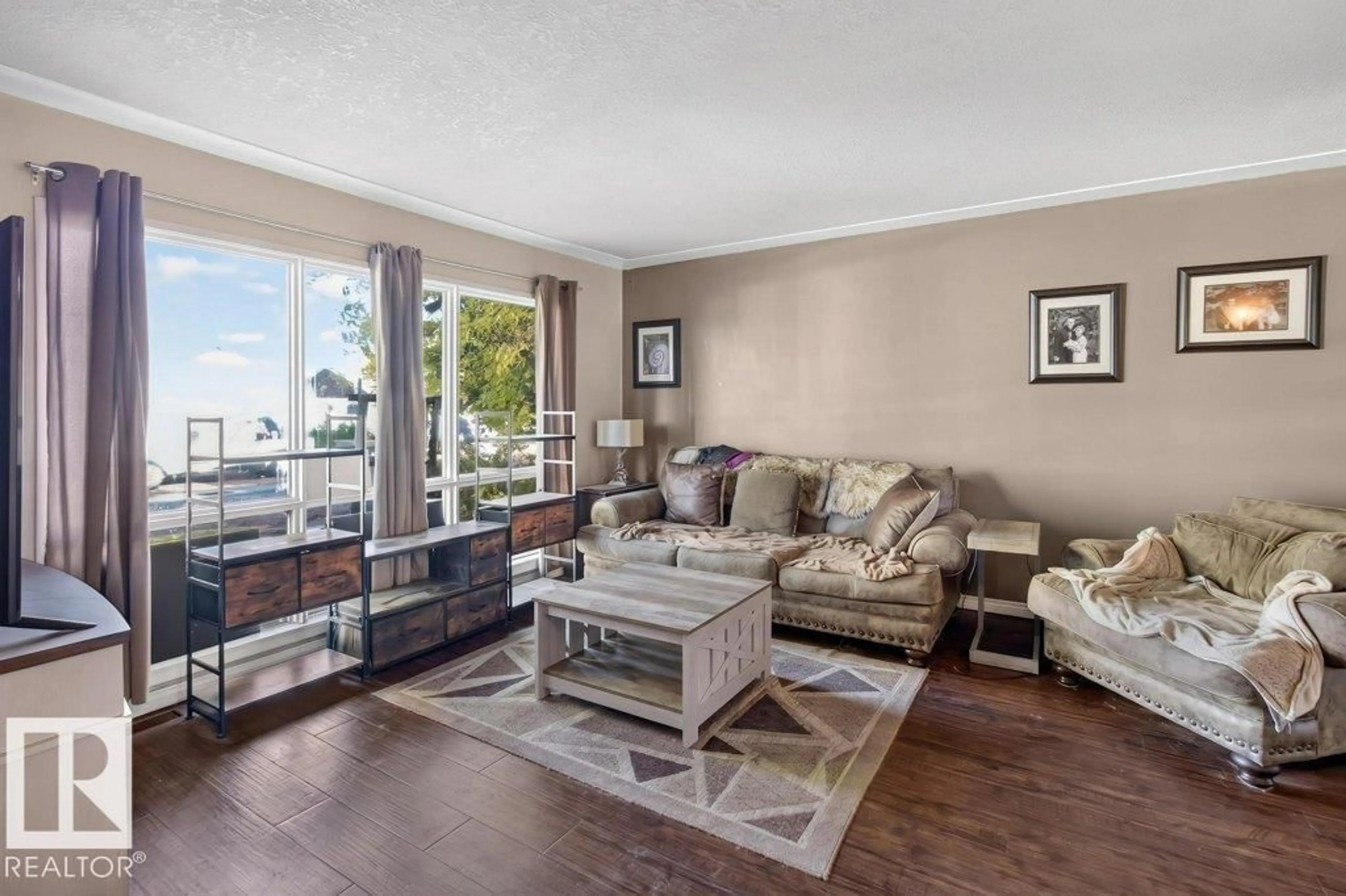 Living room with furniture, unknown for 3829 110 AV, Edmonton Alberta T5W0H8