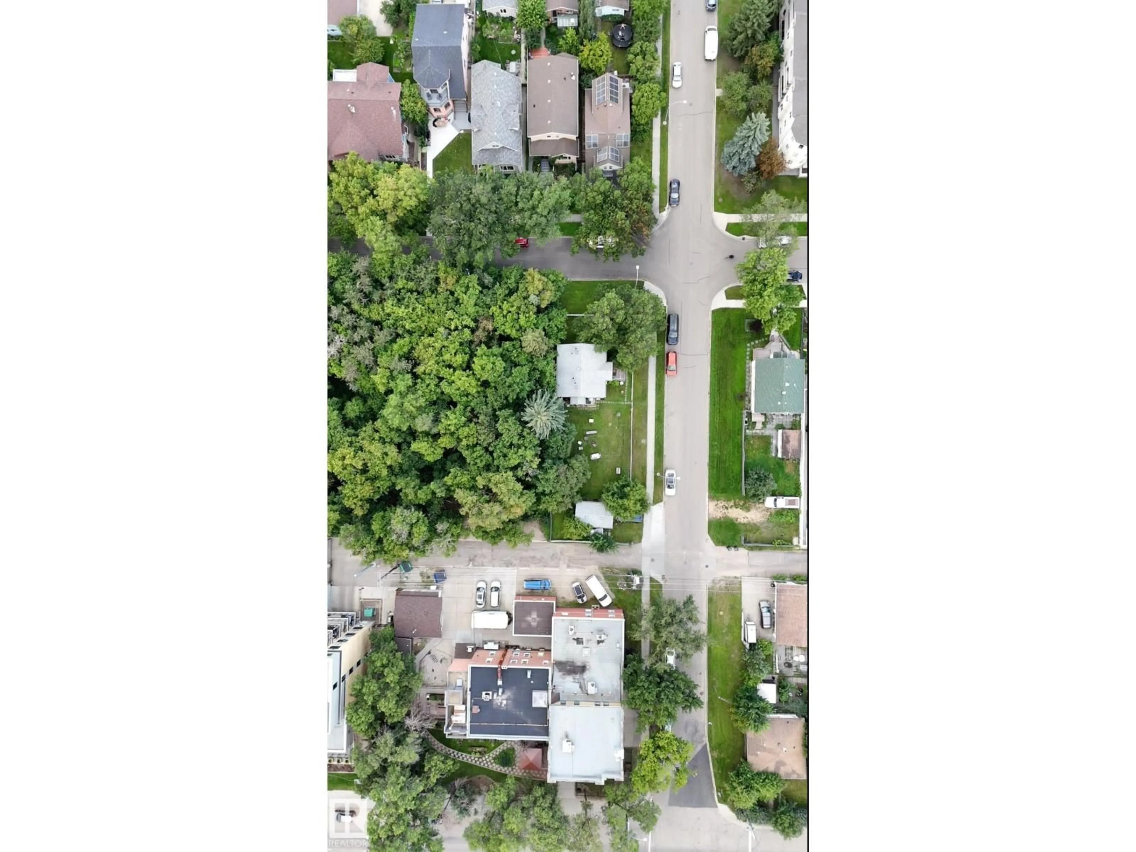 A pic from outside/outdoor area/front of a property/back of a property/a pic from drone, street for 8210 93 ST, Edmonton Alberta T6C3S7