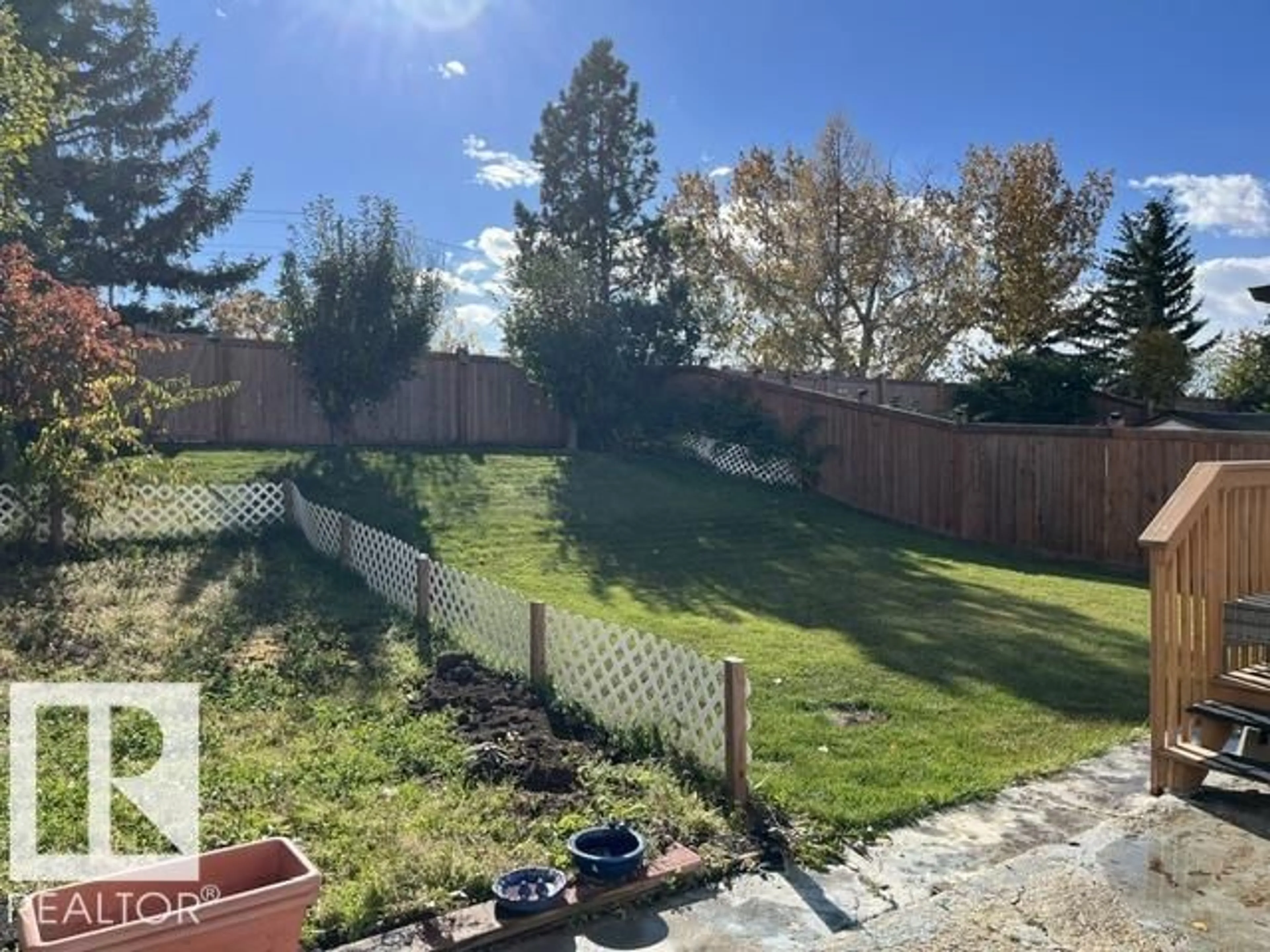 A pic from outside/outdoor area/front of a property/back of a property/a pic from drone, water/lake/river/ocean view for 11945 138 AV, Edmonton Alberta T5X4K1
