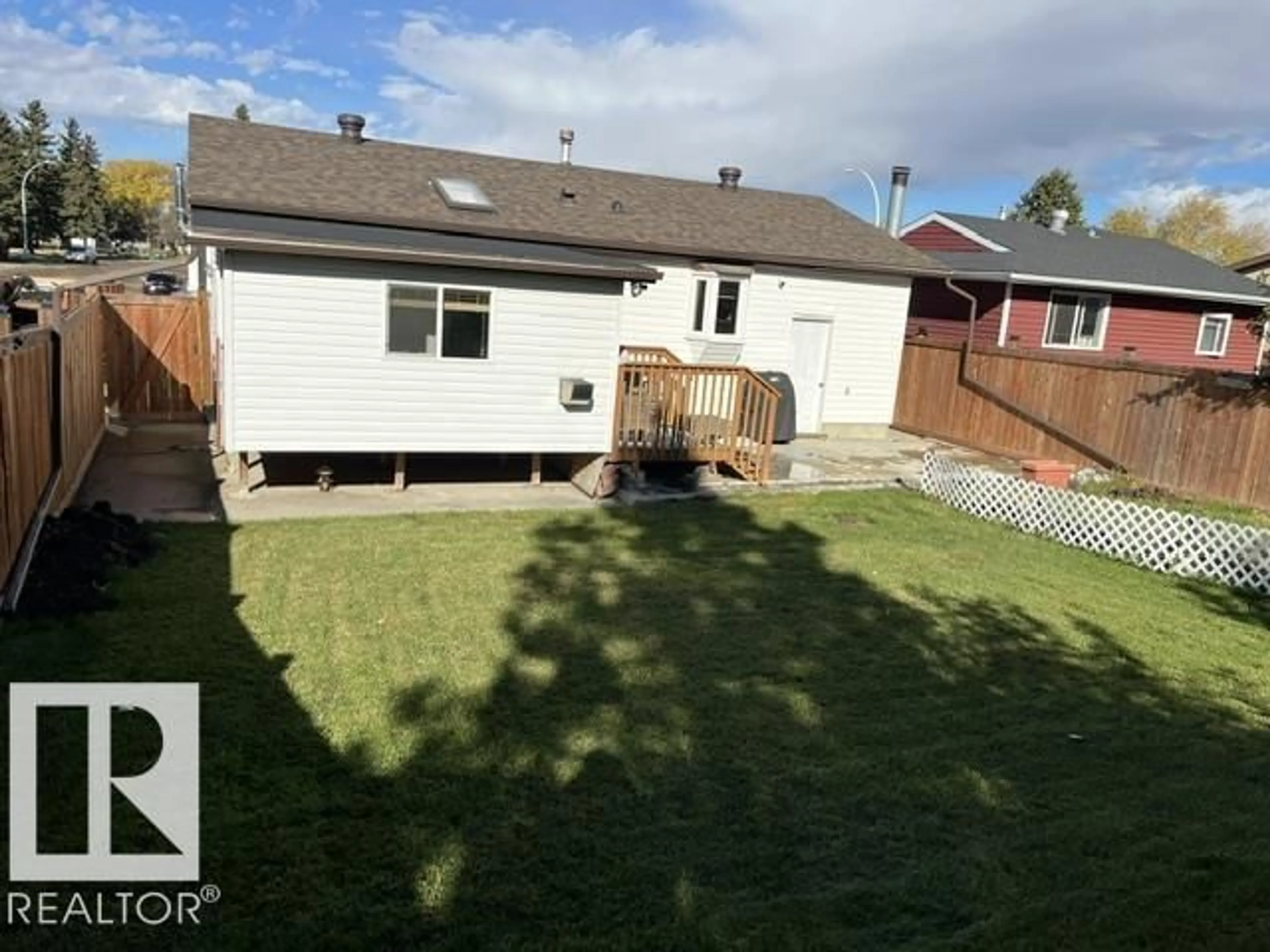 A pic from outside/outdoor area/front of a property/back of a property/a pic from drone, street for 11945 138 AV, Edmonton Alberta T5X4K1