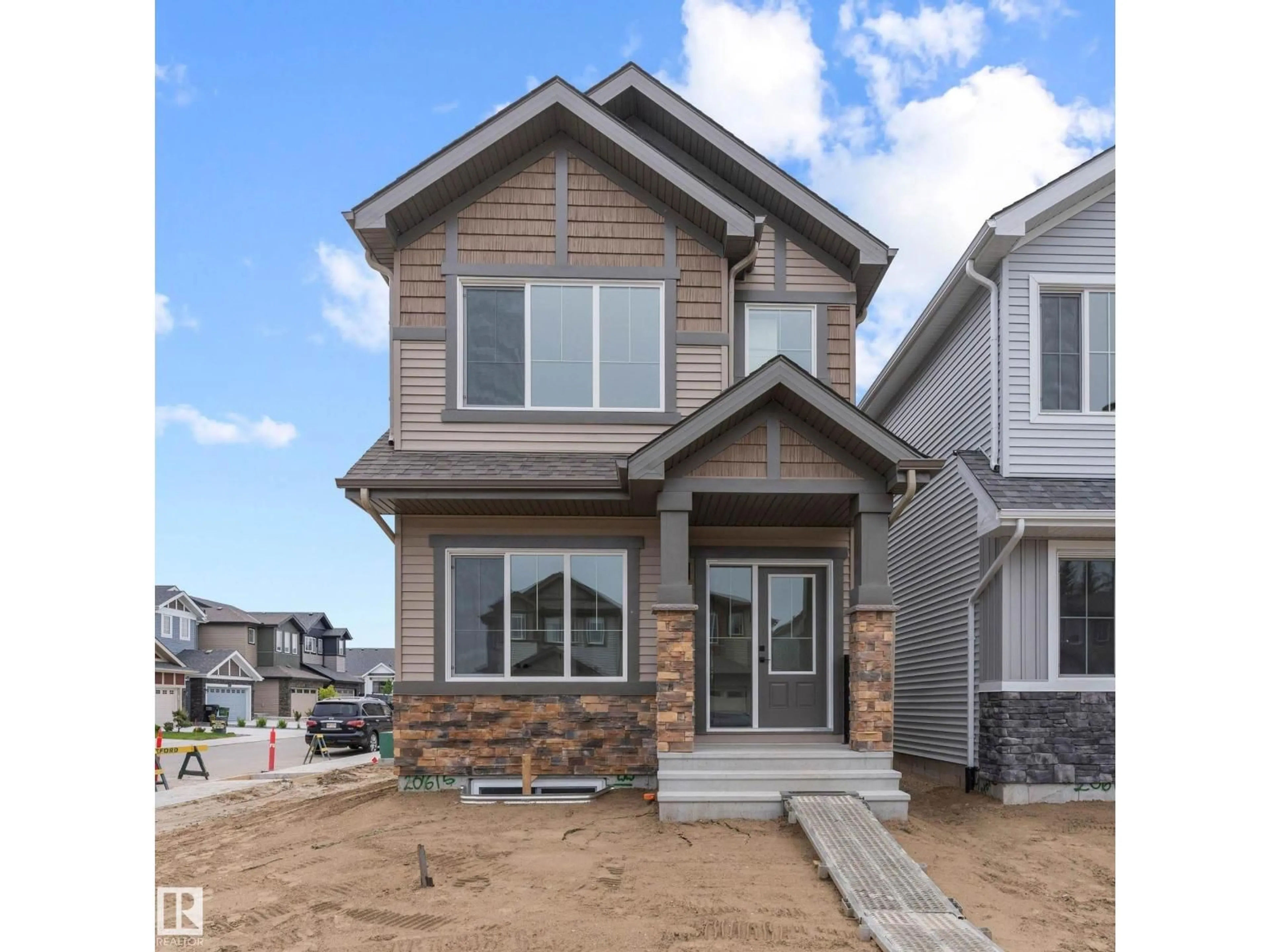 Home with vinyl exterior material, street for 20615 43 AV, Edmonton Alberta T6M3E3