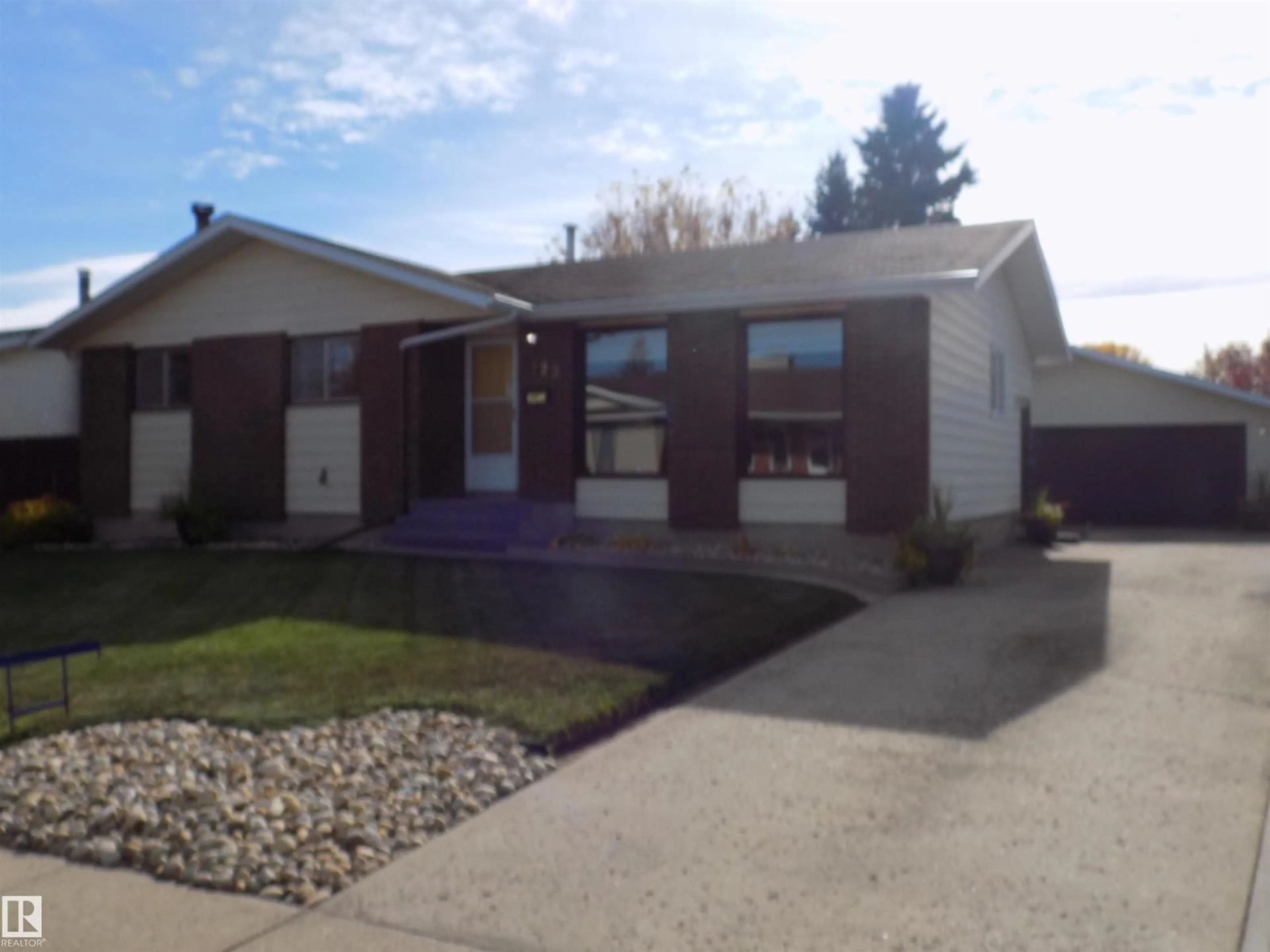 Home with vinyl exterior material, street for 129 MOUNTAIN ASH DRIVE, Wetaskiwin Alberta T9A2T4